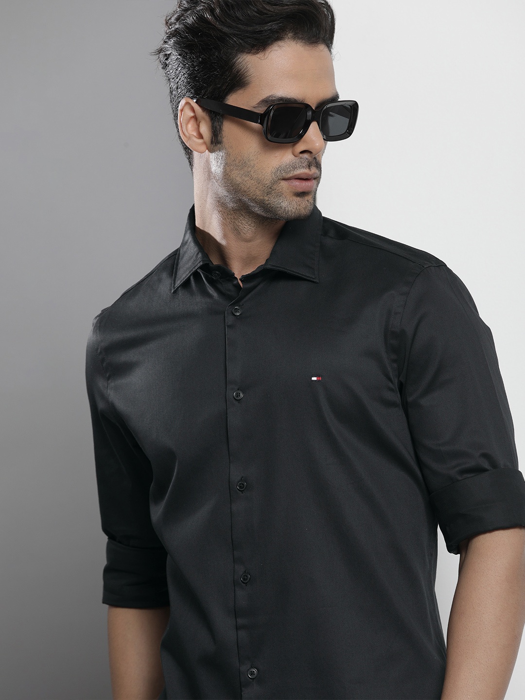 

Tommy Hilfiger Men Black Solid Slim Fit Casual Shirt