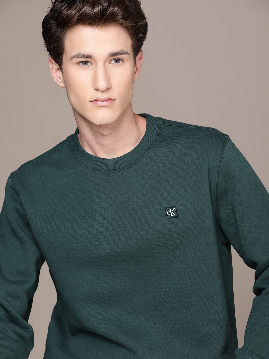 

Calvin Klein Jeans Men Teal Green Fleece Sweatshirt