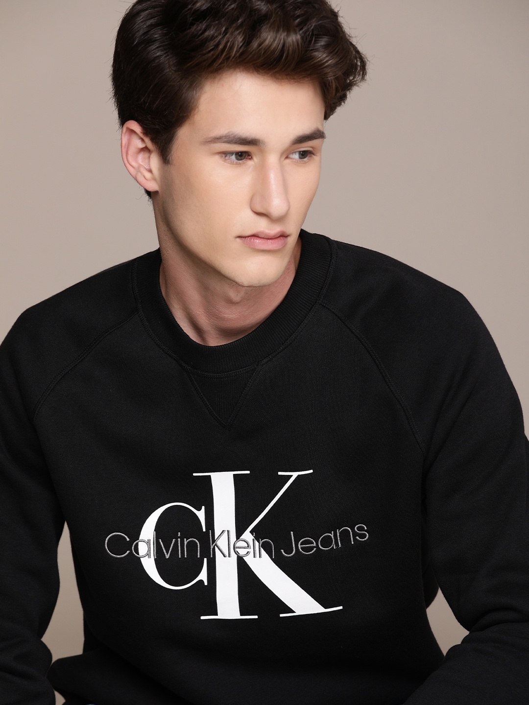 

Calvin Klein Jeans Men Black Brand Logo Printed Pullover Sweatshirt