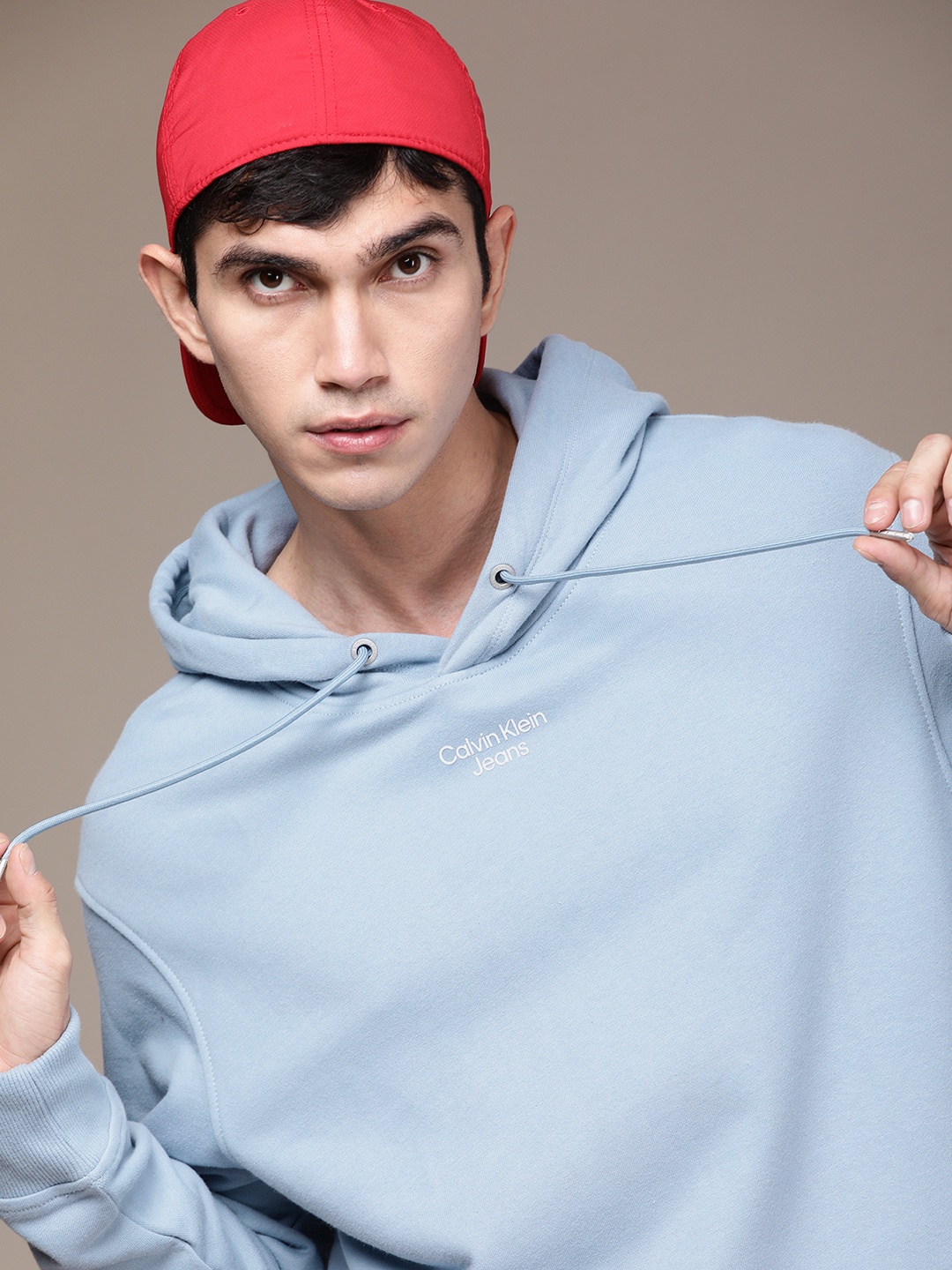 

Calvin Klein Jeans Men Blue Brand Logo Printed Hooded Sweatshirt