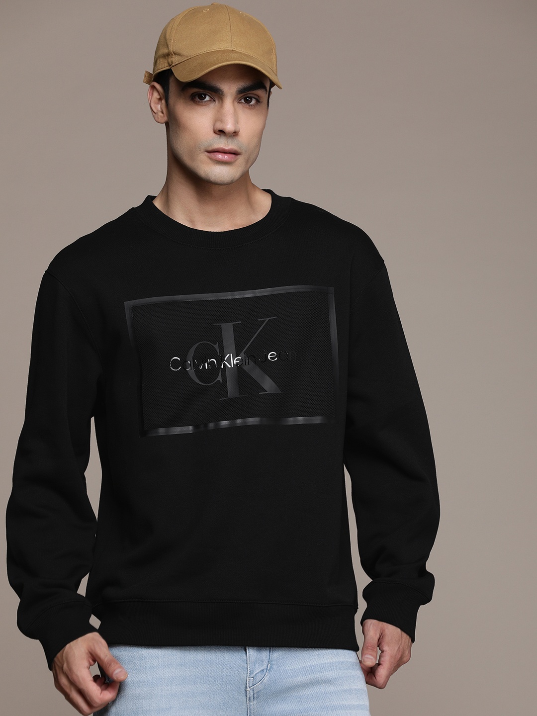 

Calvin Klein Jeans Men Black Brand Logo Solid Sweatshirt