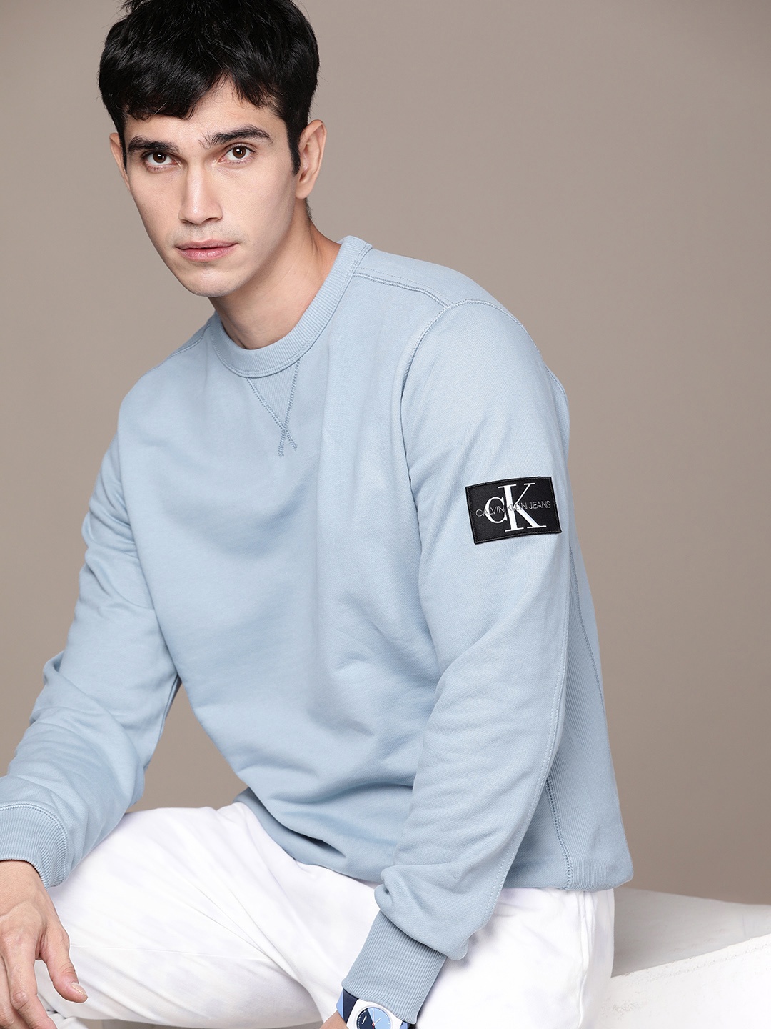 

Calvin Klein Jeans Men Blue Solid Pure Cotton Sweatshirt