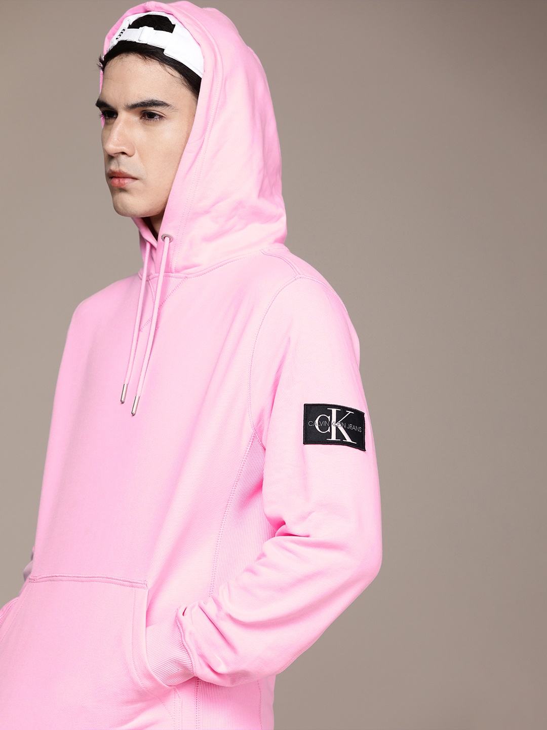 

Calvin Klein Jeans Men Pink Solid Pure Cotton Hooded Sweatshirt