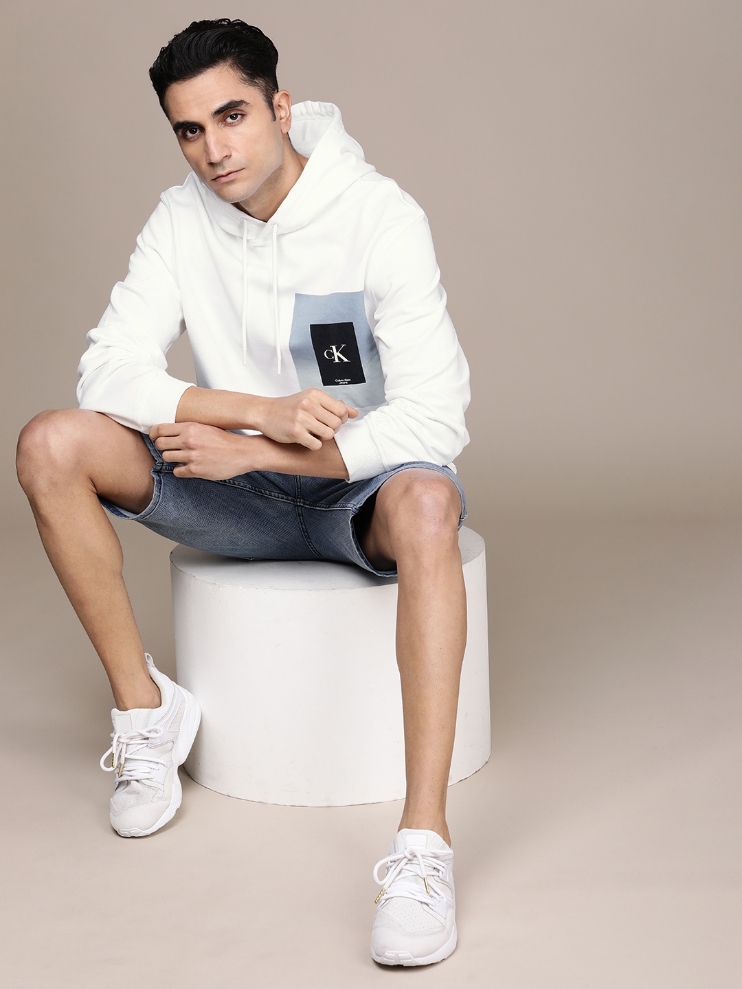 

Calvin Klein Jeans Men White Brand Logo Printed Hooded Sweatshirt