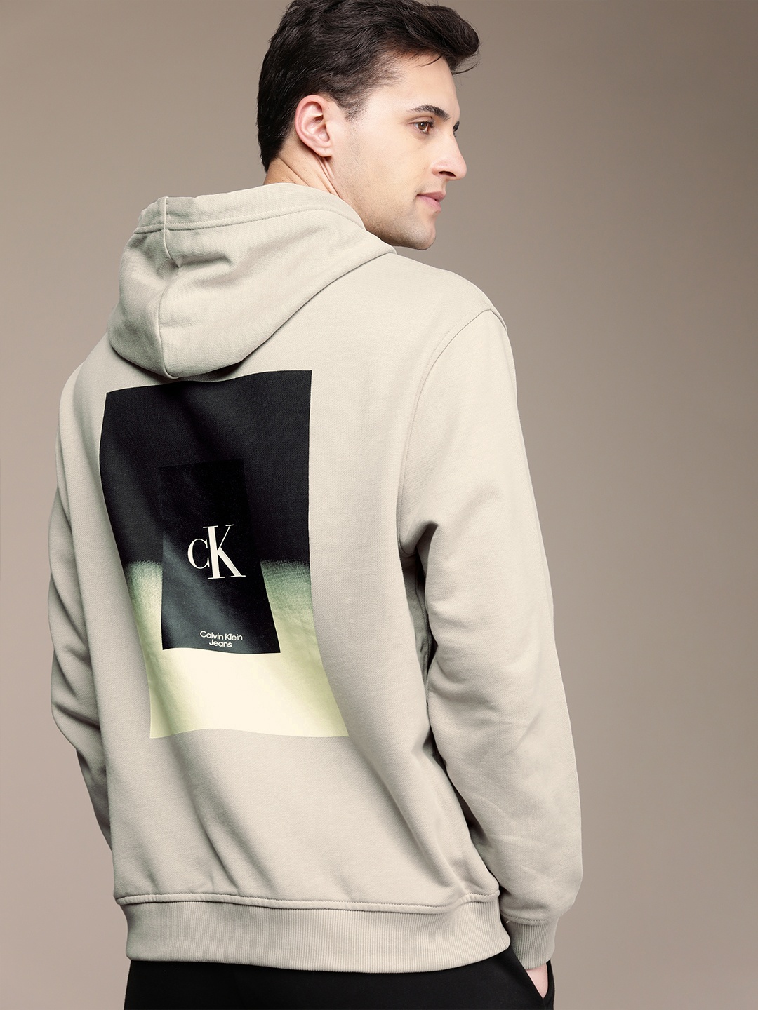

Calvin Klein Jeans Men Beige Printed Hooded Pure Cotton Sweatshirt