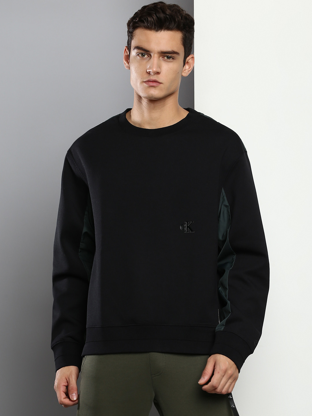 

Calvin Klein Jeans Men Black Solid Pullover Sweatshirt With Zip Detail