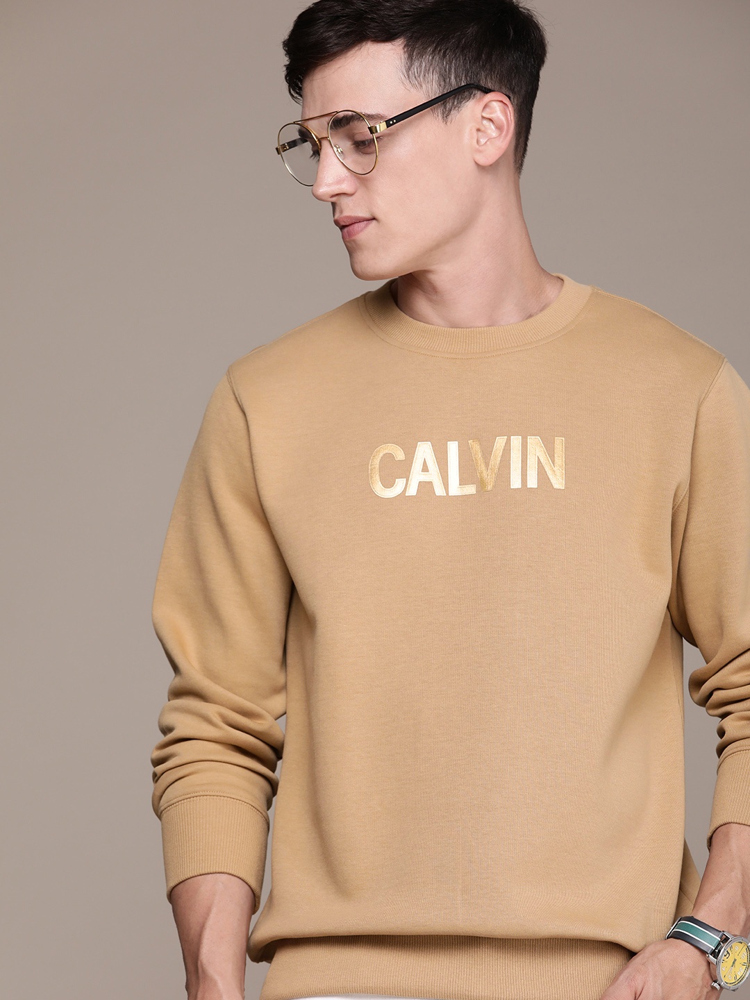 

Calvin Klein Jeans Men Camel Brown Brand Logo Printed Sweatshirt
