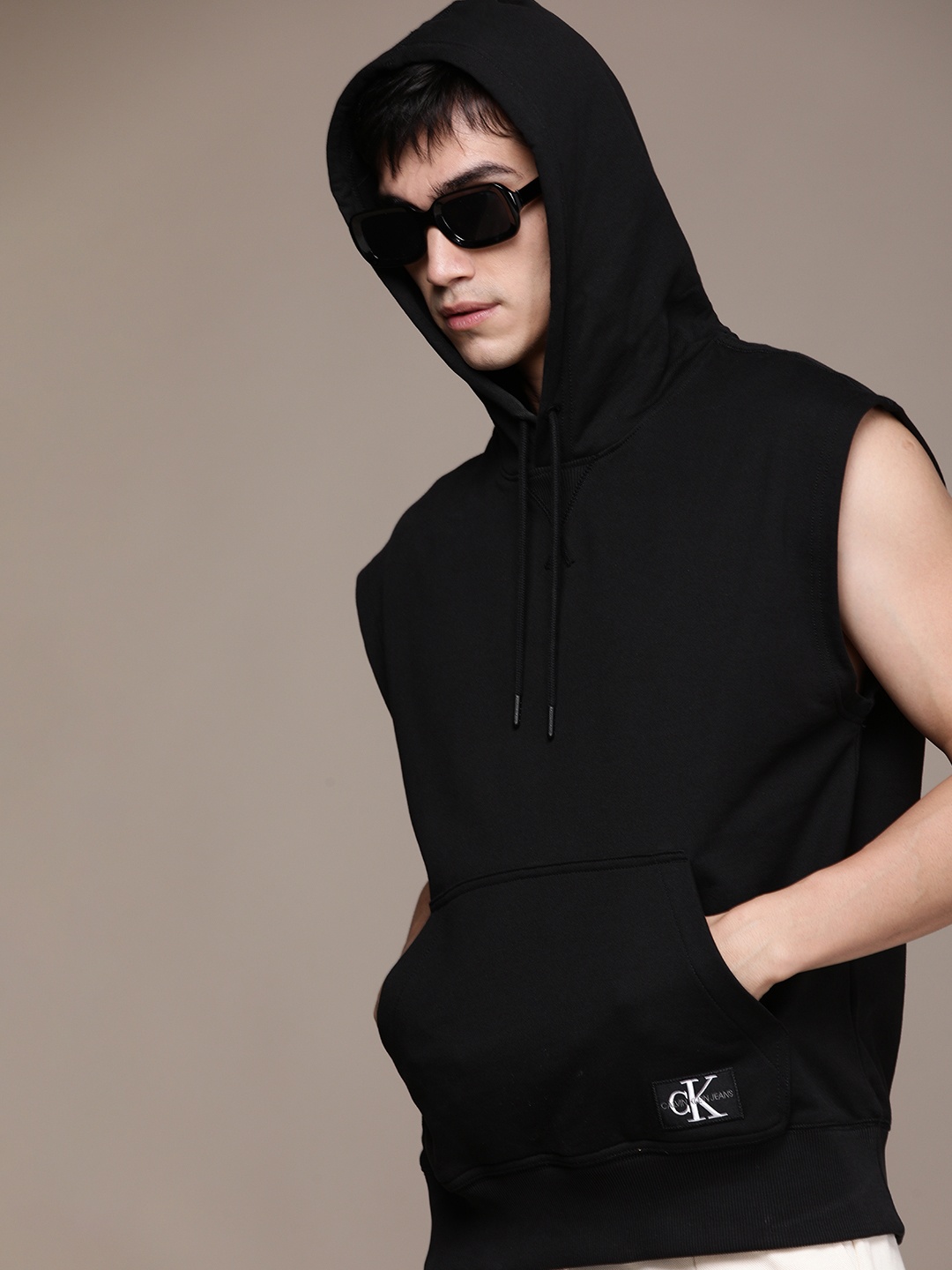 

Calvin Klein Jeans Men Black Solid Sleeveless Hooded Sweatshirt