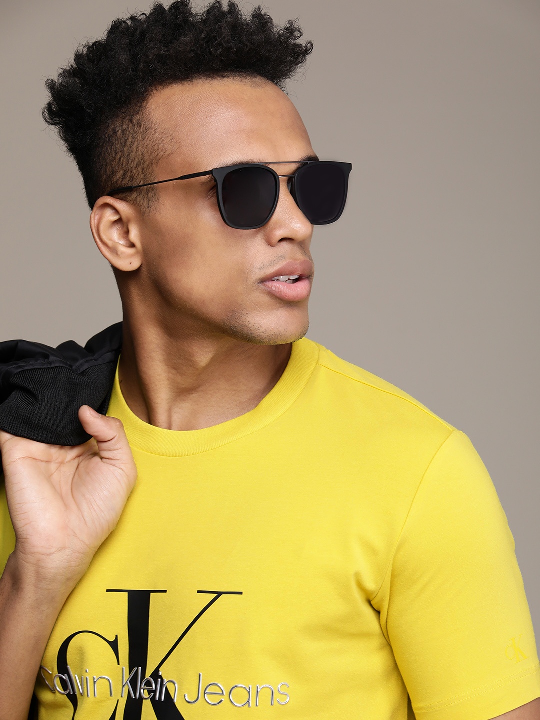 

Calvin Klein Jeans Men Yellow Brand Logo Printed Applique Slim Fit T-shirt