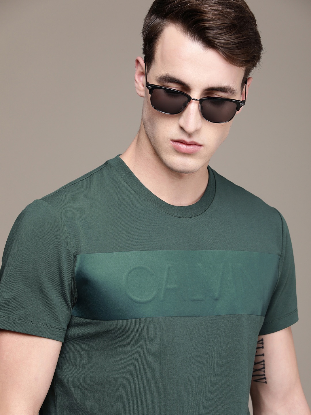 

Calvin Klein Jeans Men Teal Green Brand Logo Printed Casual T-shirt