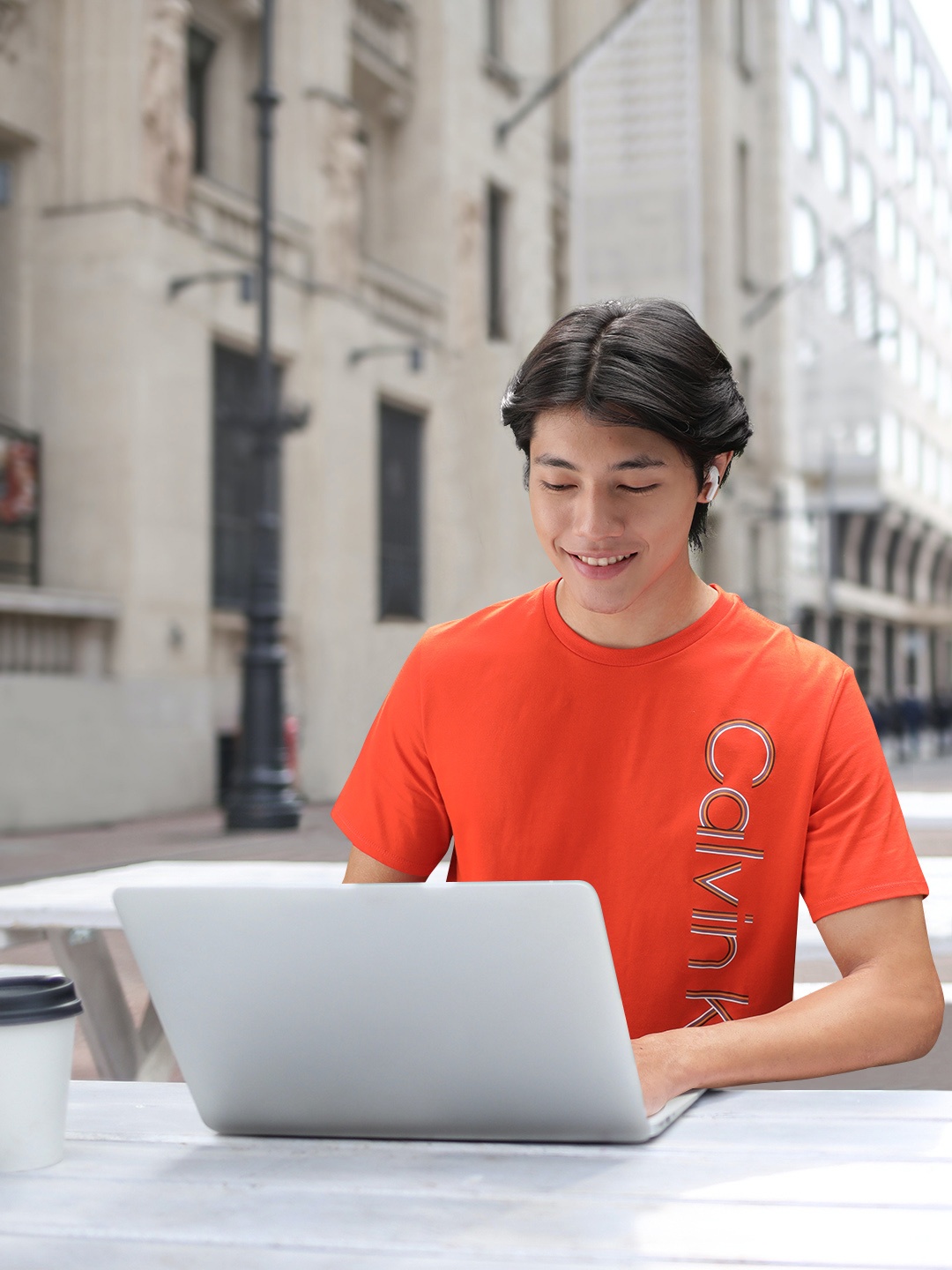 

Calvin Klein Jeans Men Orange Brand Logo Printed Pure Cotton T-shirt