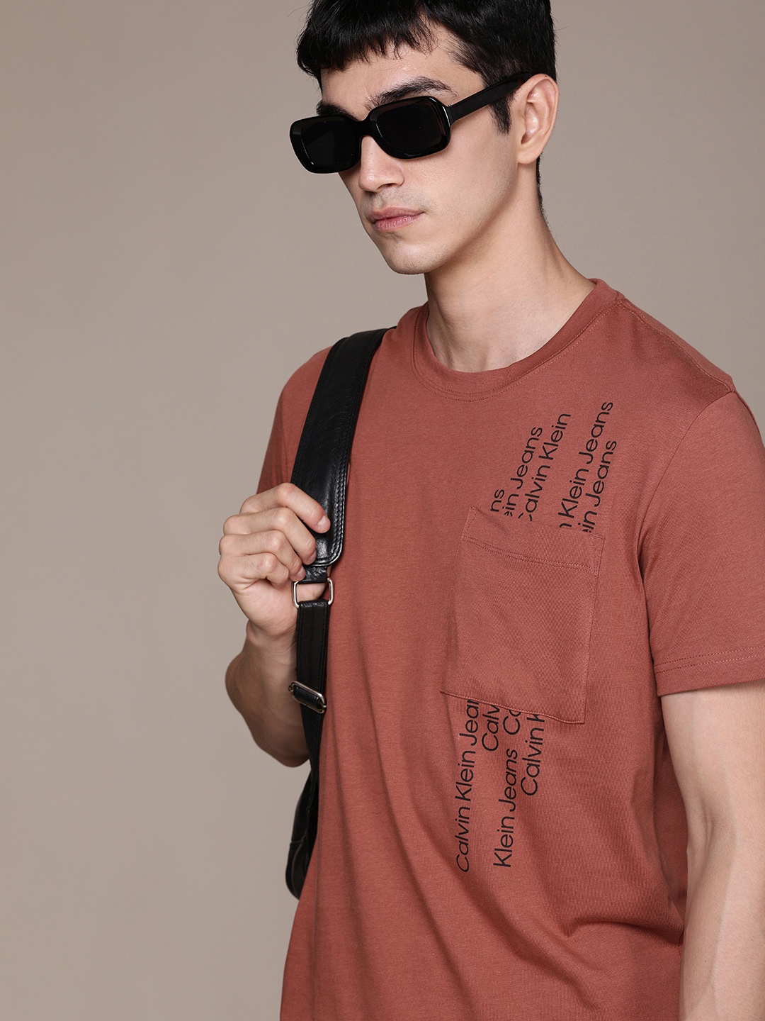 

Calvin Klein Jeans Men Rust Red Brand Logo Printed Pure Cotton Slim Fit T-shirt