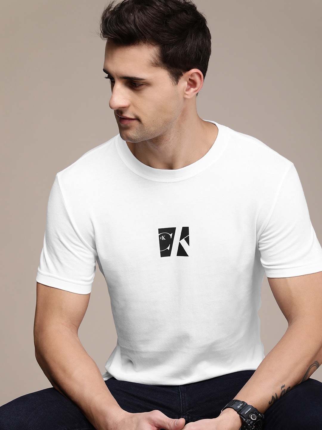 

Calvin Klein Jeans Men White Brand Logo Printed Pure Cotton T-shirt