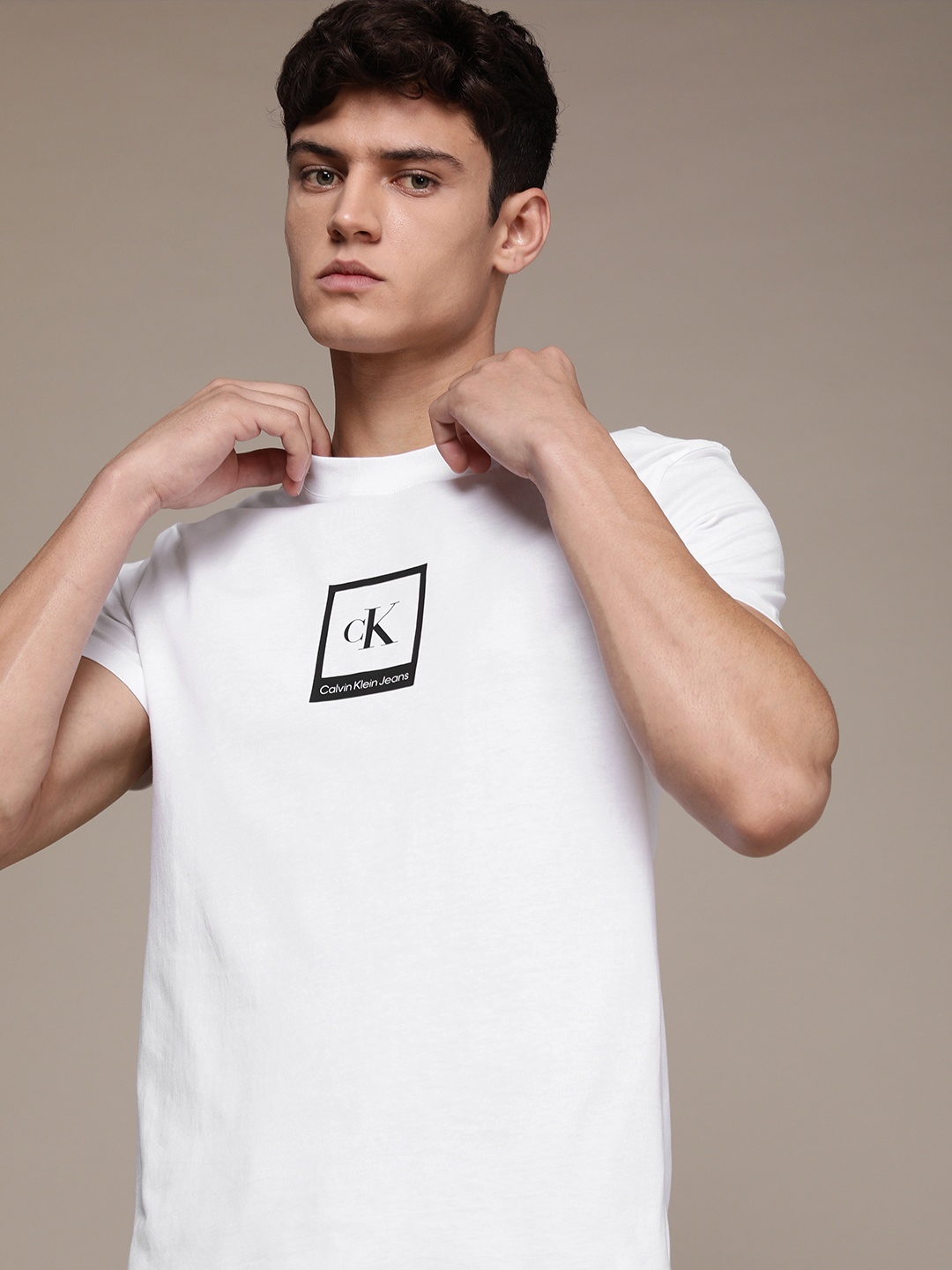 

Calvin Klein Jeans Men White Brand Logo Print Slim Fit T-shirt