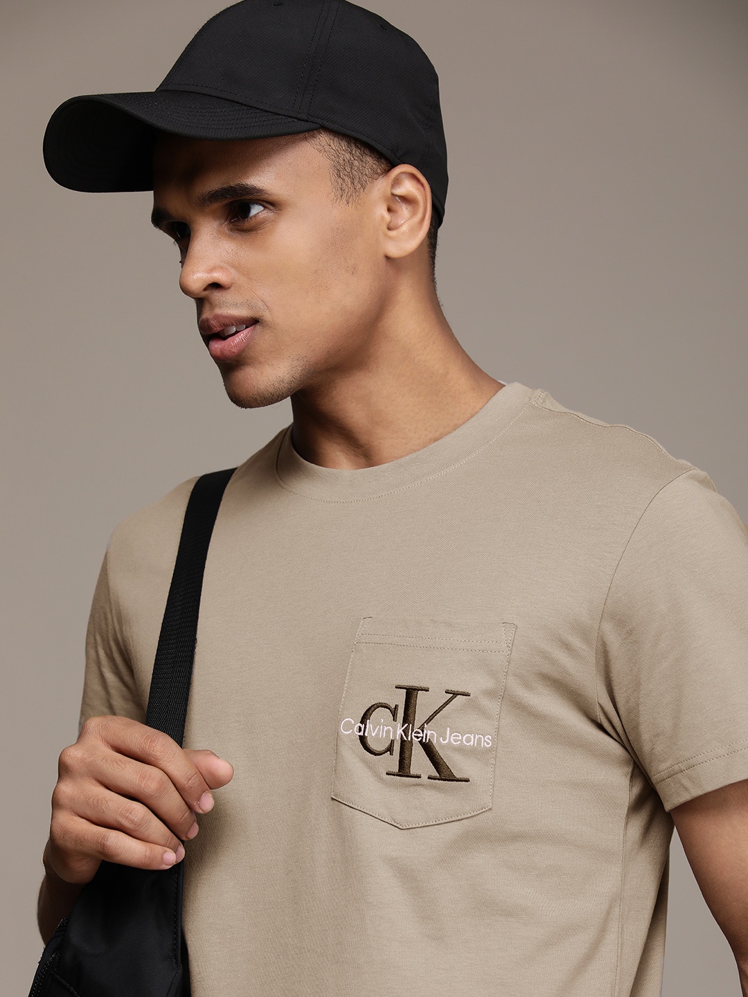 

Calvin Klein Jeans Men Beige Brand Logo Embroidered Pure Cotton T-shirt