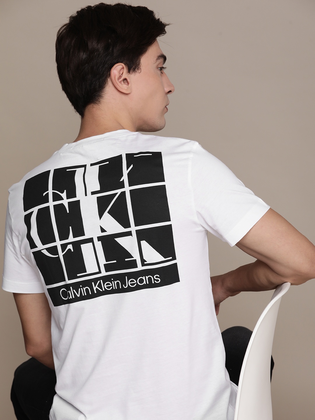 

Calvin Klein Jeans Men White Brand Logo Printed Pure Cotton T-shirt