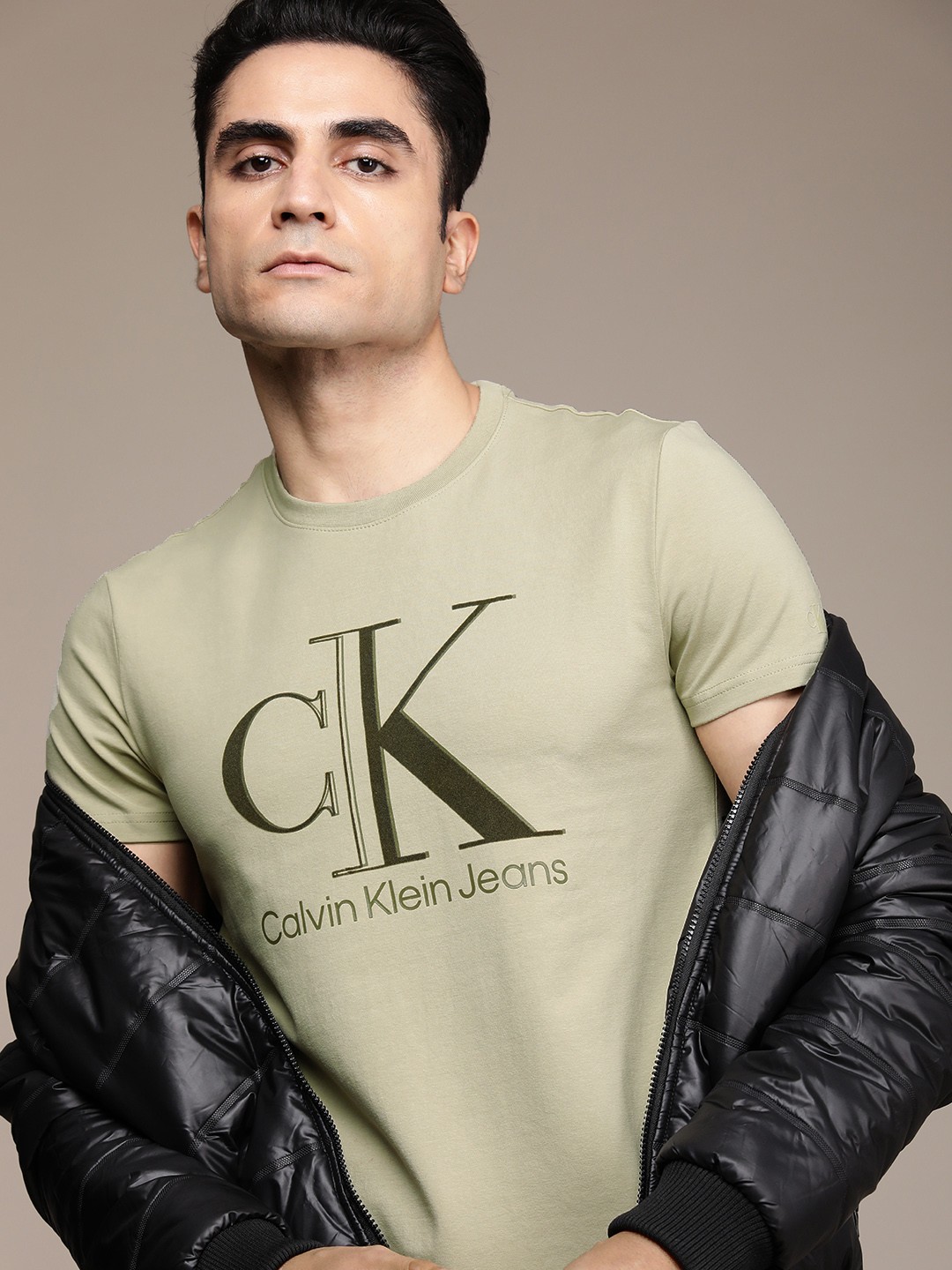 

Calvin Klein Jeans Men Beige Brand Logo Printed T-shirt