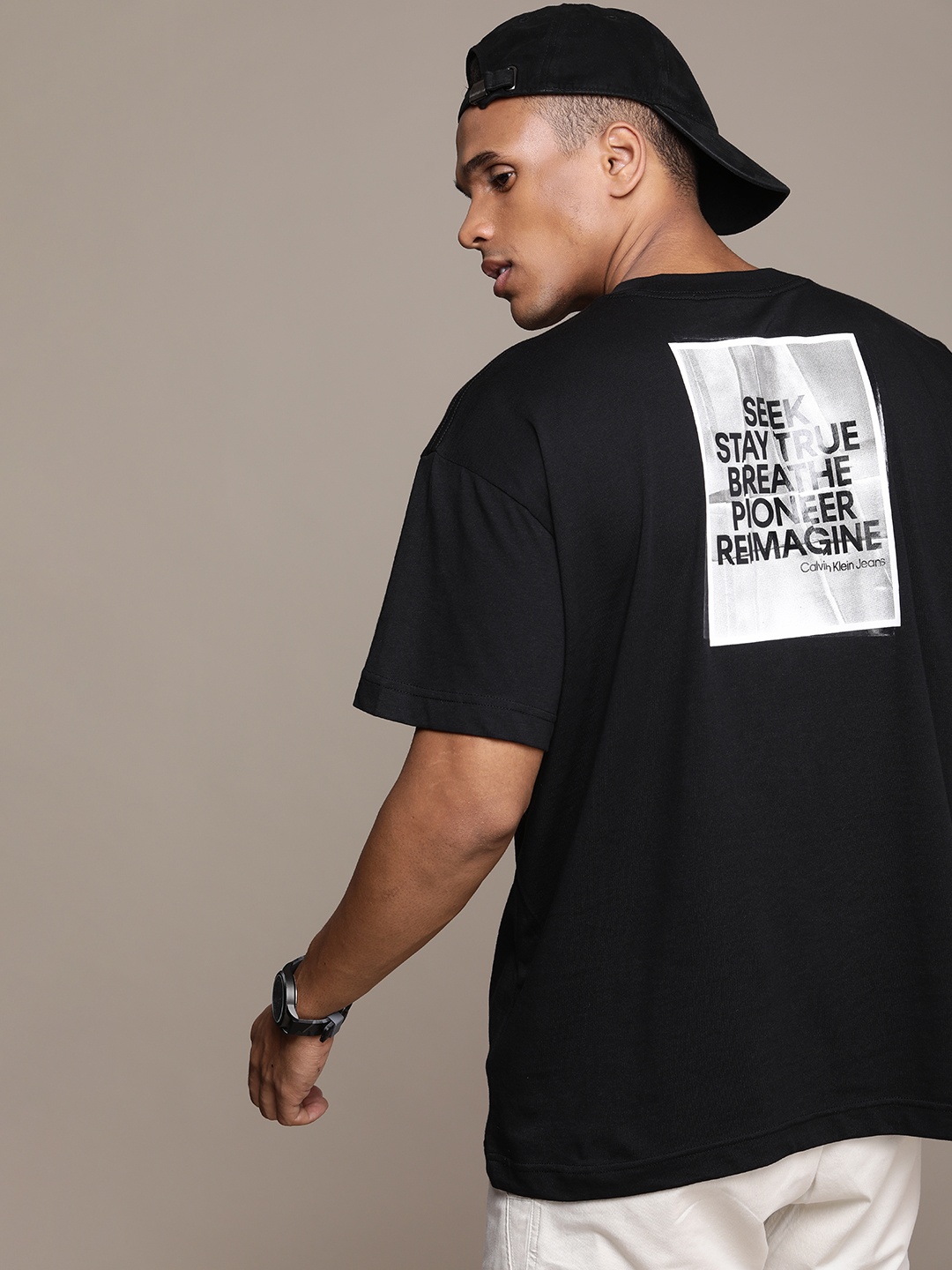 

Calvin Klein Jeans Men Black Typography Printed Pure Cotton Slim Fit T-shirt