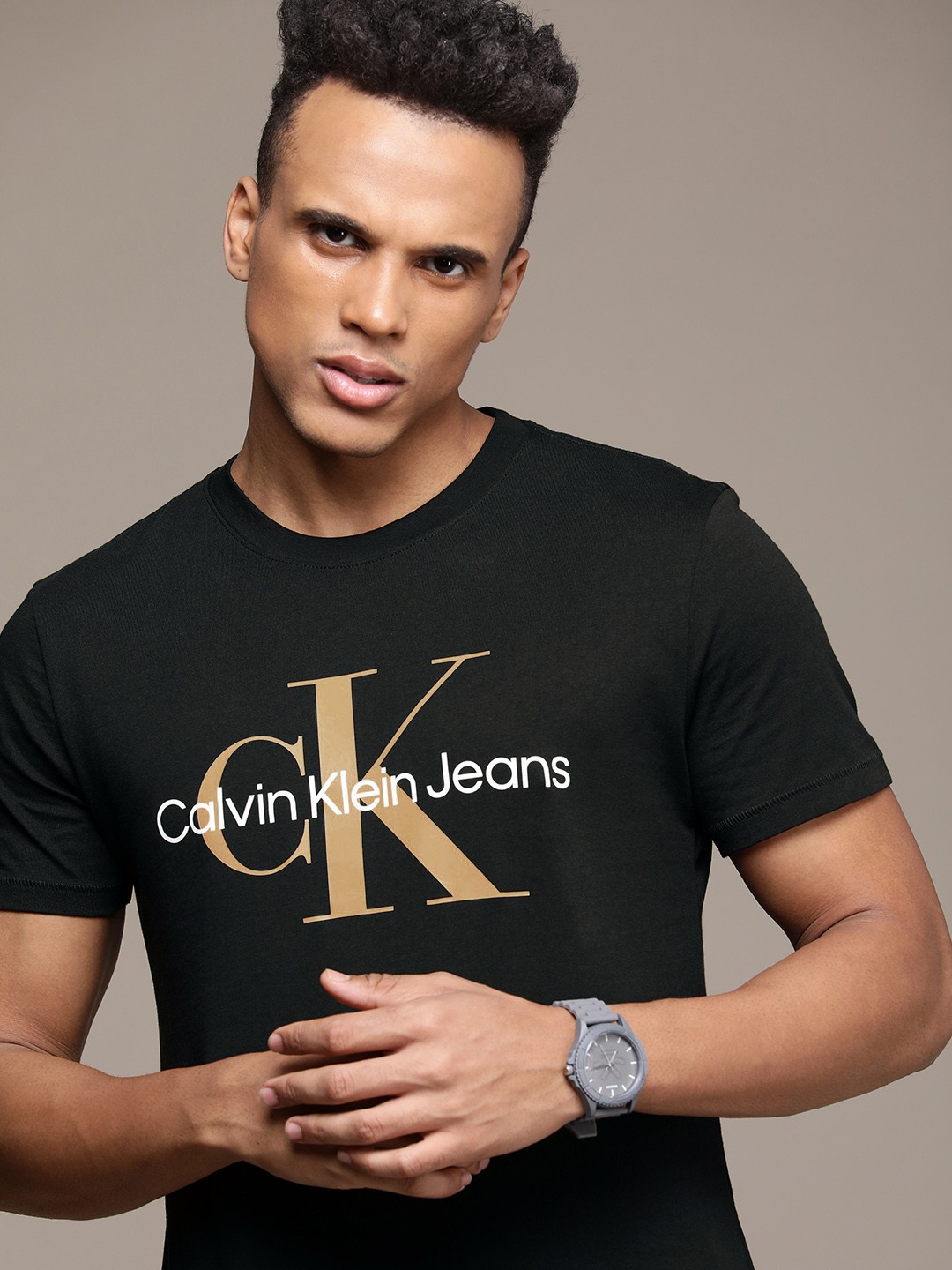 

Calvin Klein Jeans Men Black & White Brand Logo Printed Pure Cotton Slim Fit T-shirt