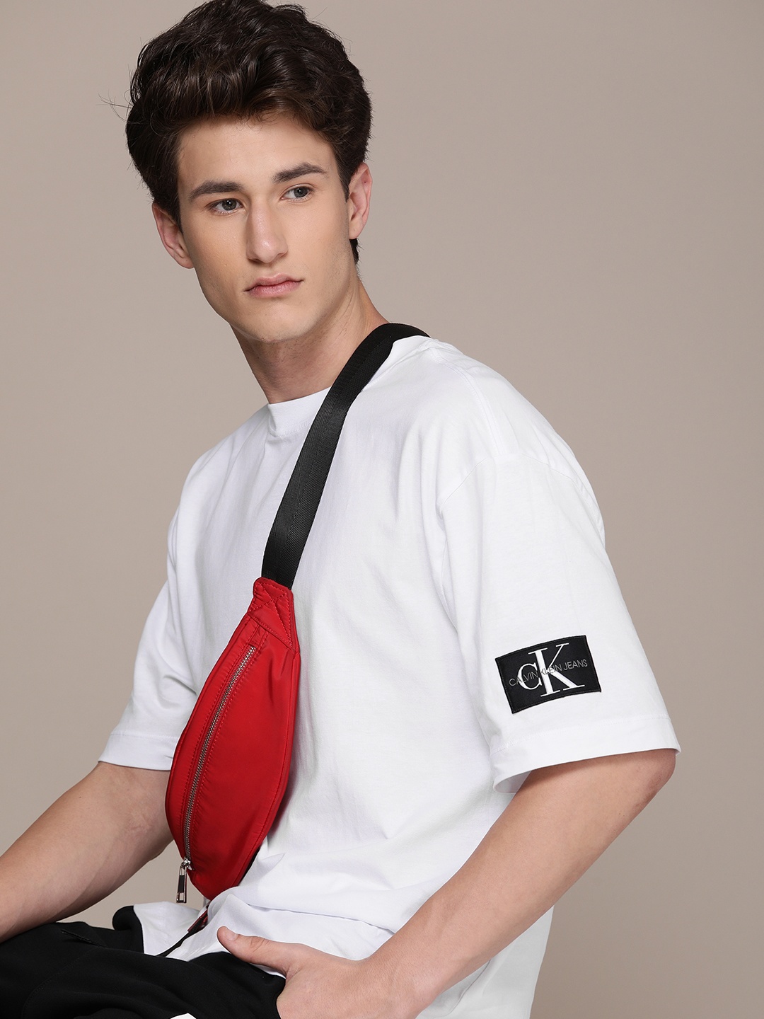 

Calvin Klein Jeans Men White Drop-Shoulder Sleeves Pure Cotton T-shirt