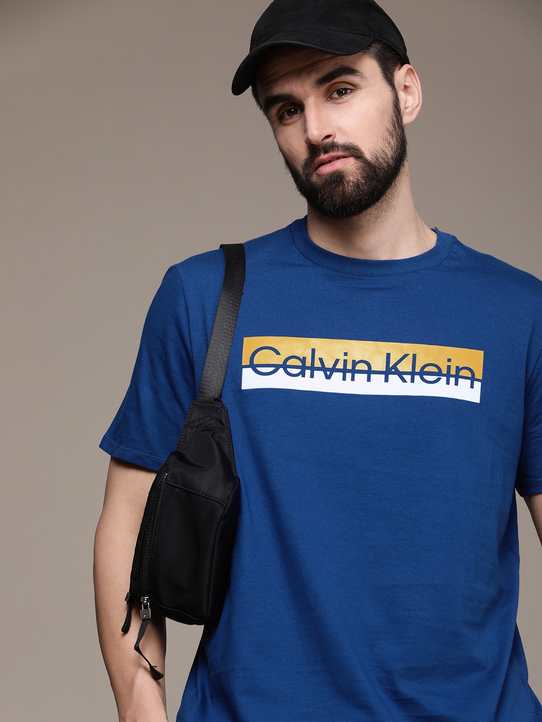 

Calvin Klein Jeans Men Blue & Yellow Typography Printed Pure Cotton T-shirt