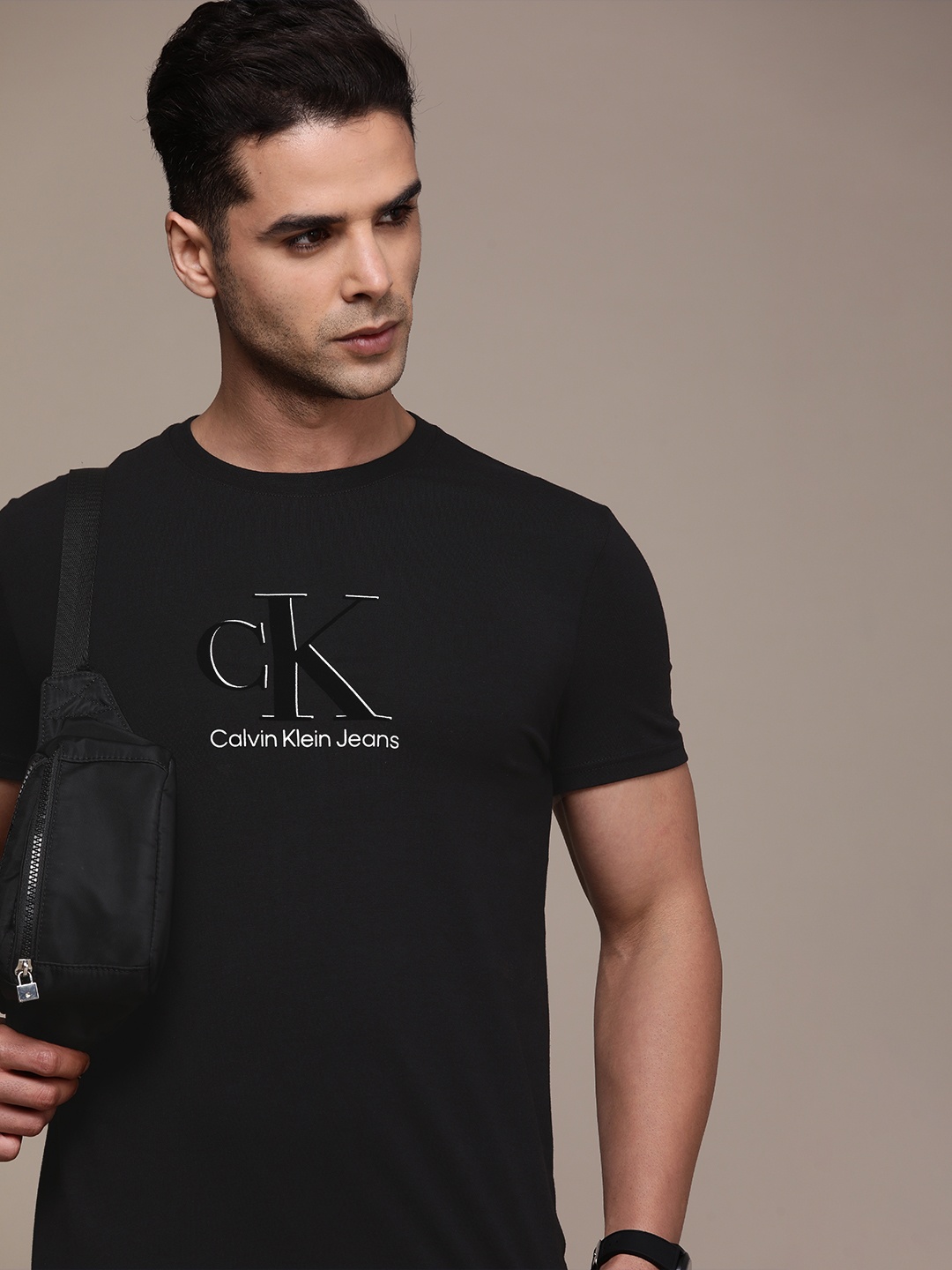 

Calvin Klein Jeans Men Black Brand Logo Print Round Neck Slim Fit T-shirt