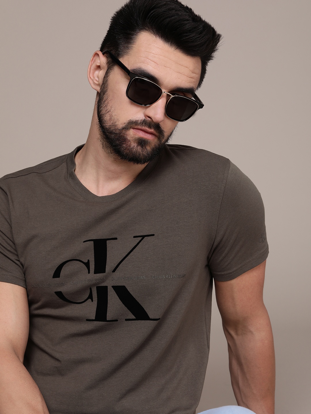 

Calvin Klein Jeans Men Brown Brand Logo Round Neck Short Sleeve T-shirt