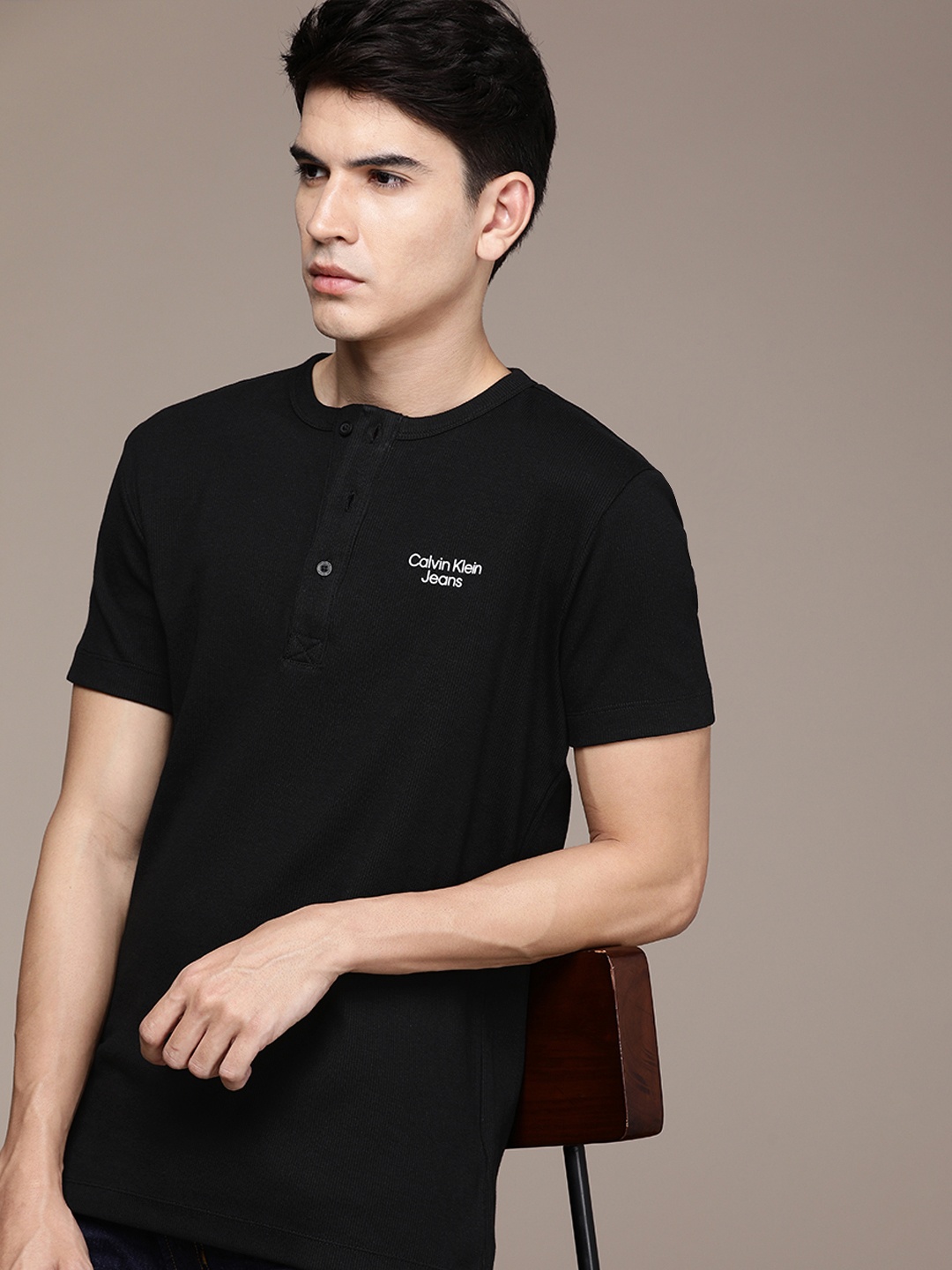

Calvin Klein Jeans Men Black Self Striped Henley Neck T-shirt