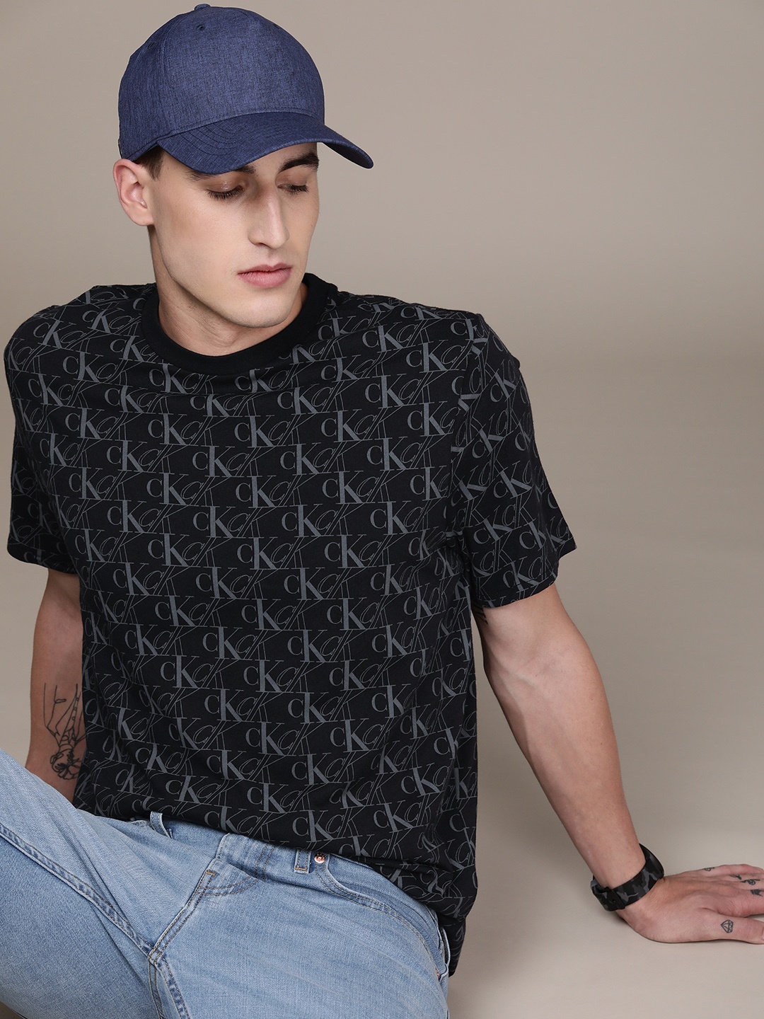 

Calvin Klein Jeans Men Black & Grey Brand Logo Printed Pure Cotton T-shirt