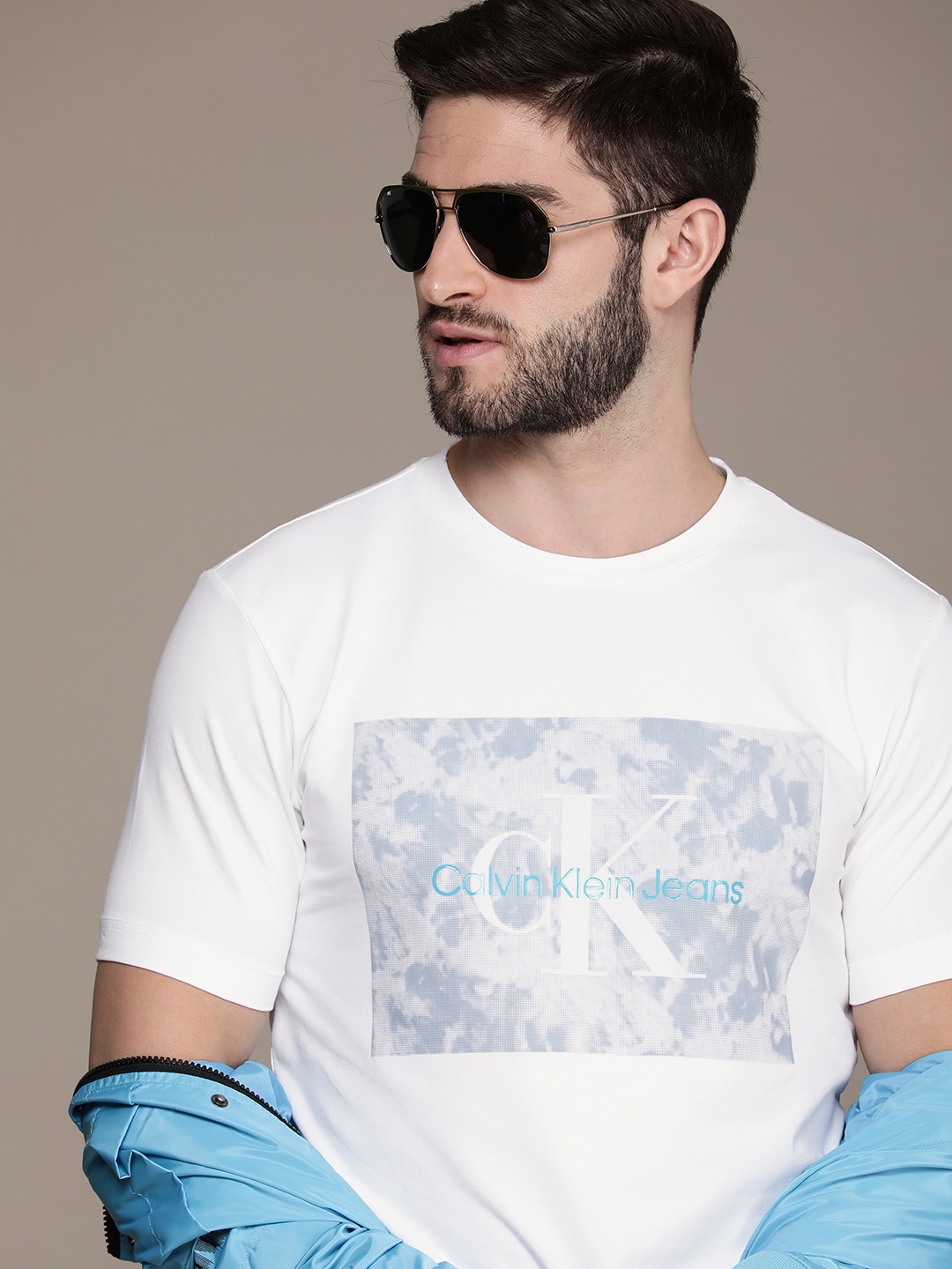 

Calvin Klein Jeans Men White Brand Logo Printed Pure Cotton T-shirt
