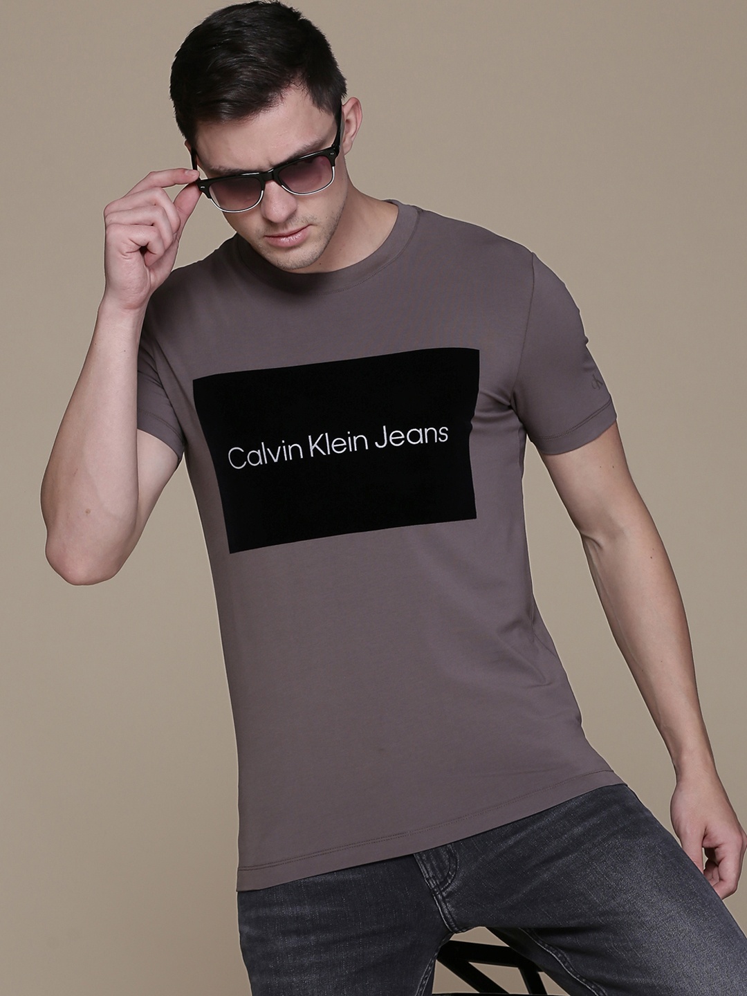 

Calvin Klein Jeans Men Brown & Black Brand Logo Printed Slim Fit T-shirt