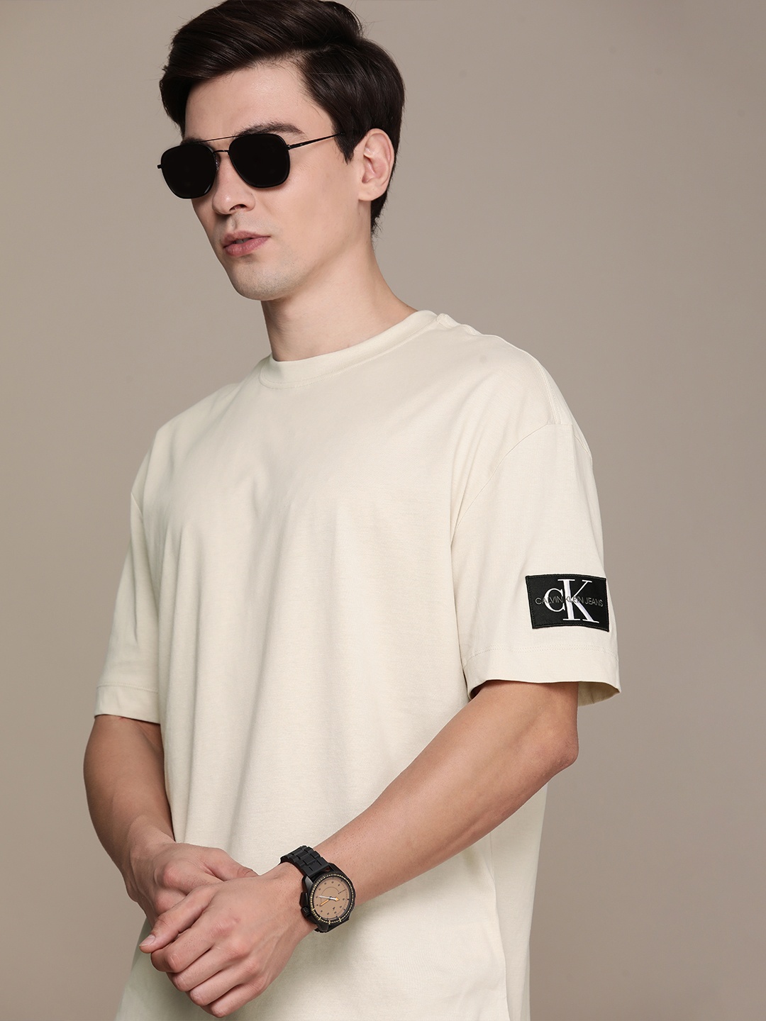 

Calvin Klein Jeans Men Beige Pure Cotton Slim Fit T-shirt