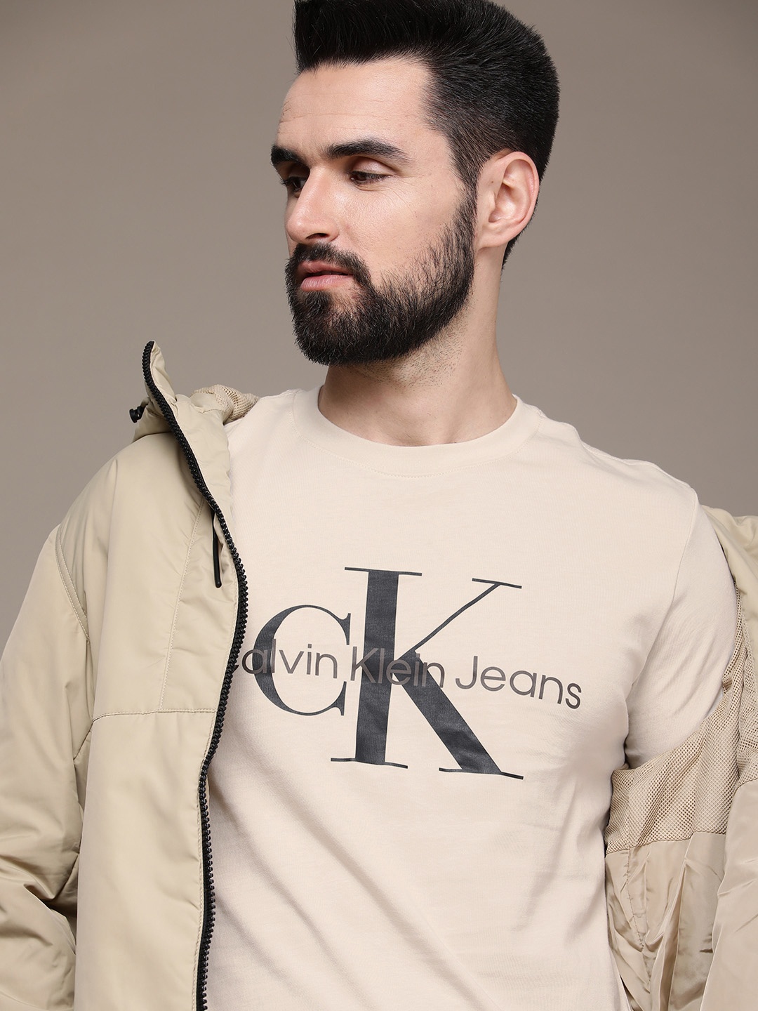 

Calvin Klein Jeans Men Beige & Black Brand Logo Printed Pure Cotton Slim Fit T-shirt