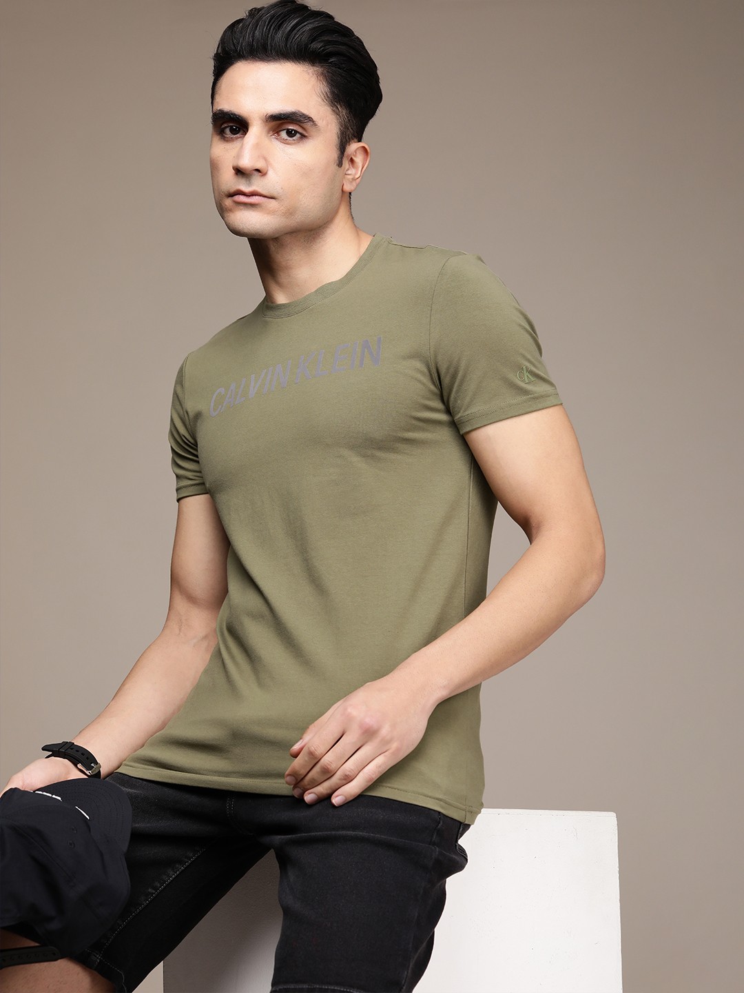 

Calvin Klein Jeans Men Olive Green Typography Printed Slim Fit T-shirt