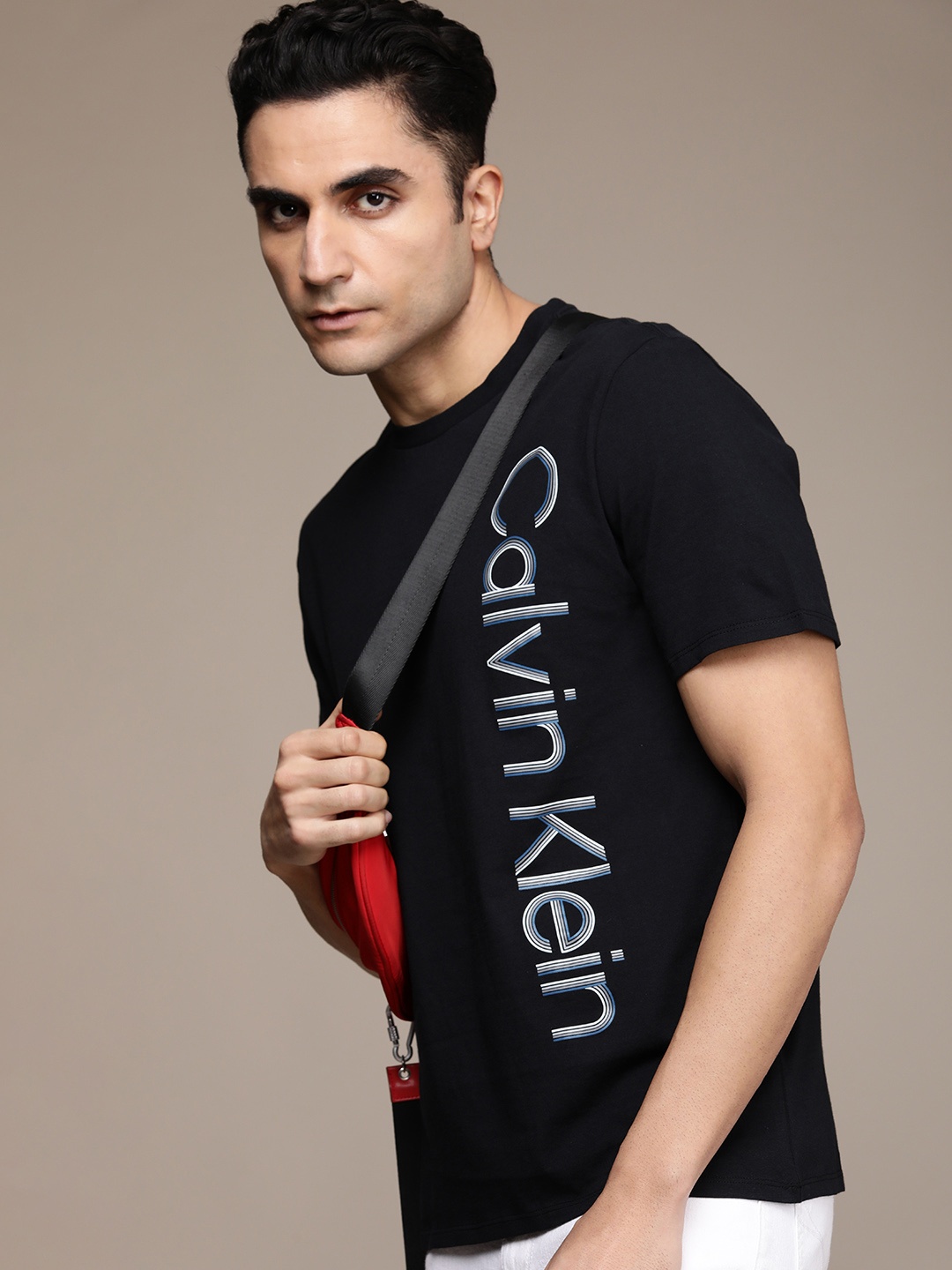

Calvin Klein Jeans Men Black Typography Printed Pure Cotton Slim Fit T-shirt