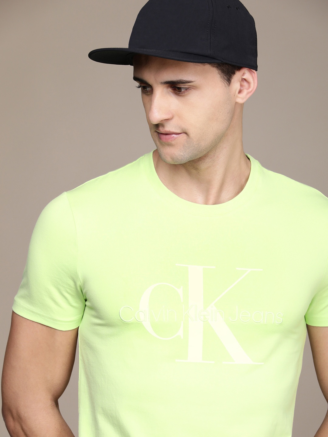 

Calvin Klein Jeans Men Mint Green & White Brand Logo Printed T-shirt