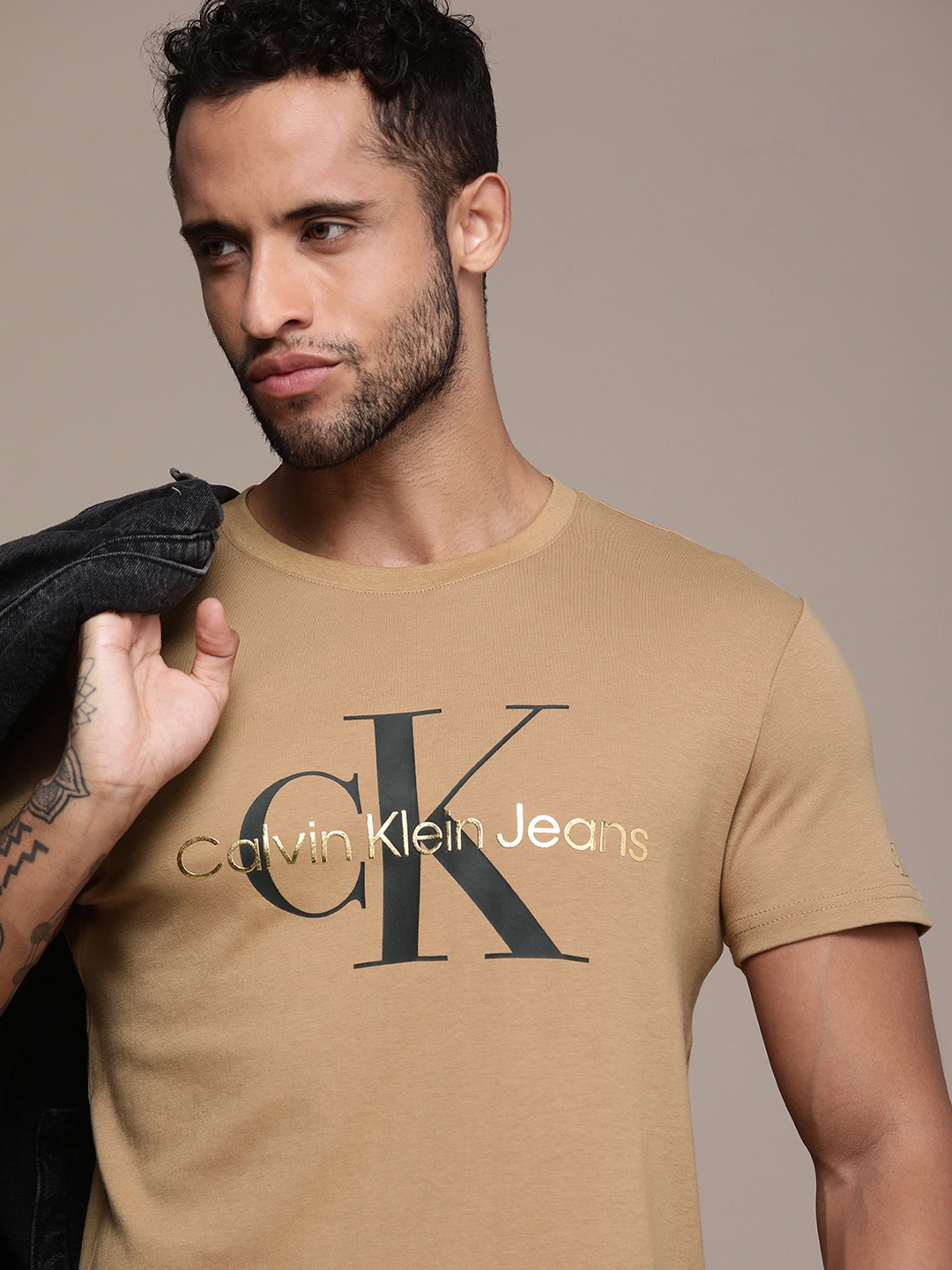 

Calvin Klein Jeans Men Brown Brand Logo Printed Pure Cotton T-shirt