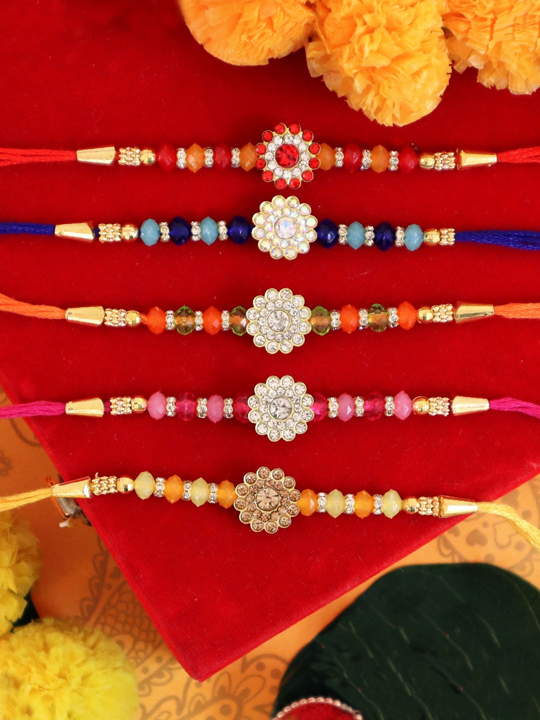 

TIED RIBBONS Set Of 5 Pearl Floral Rakhi, Card & Roli Chawal Gift Set, Multi