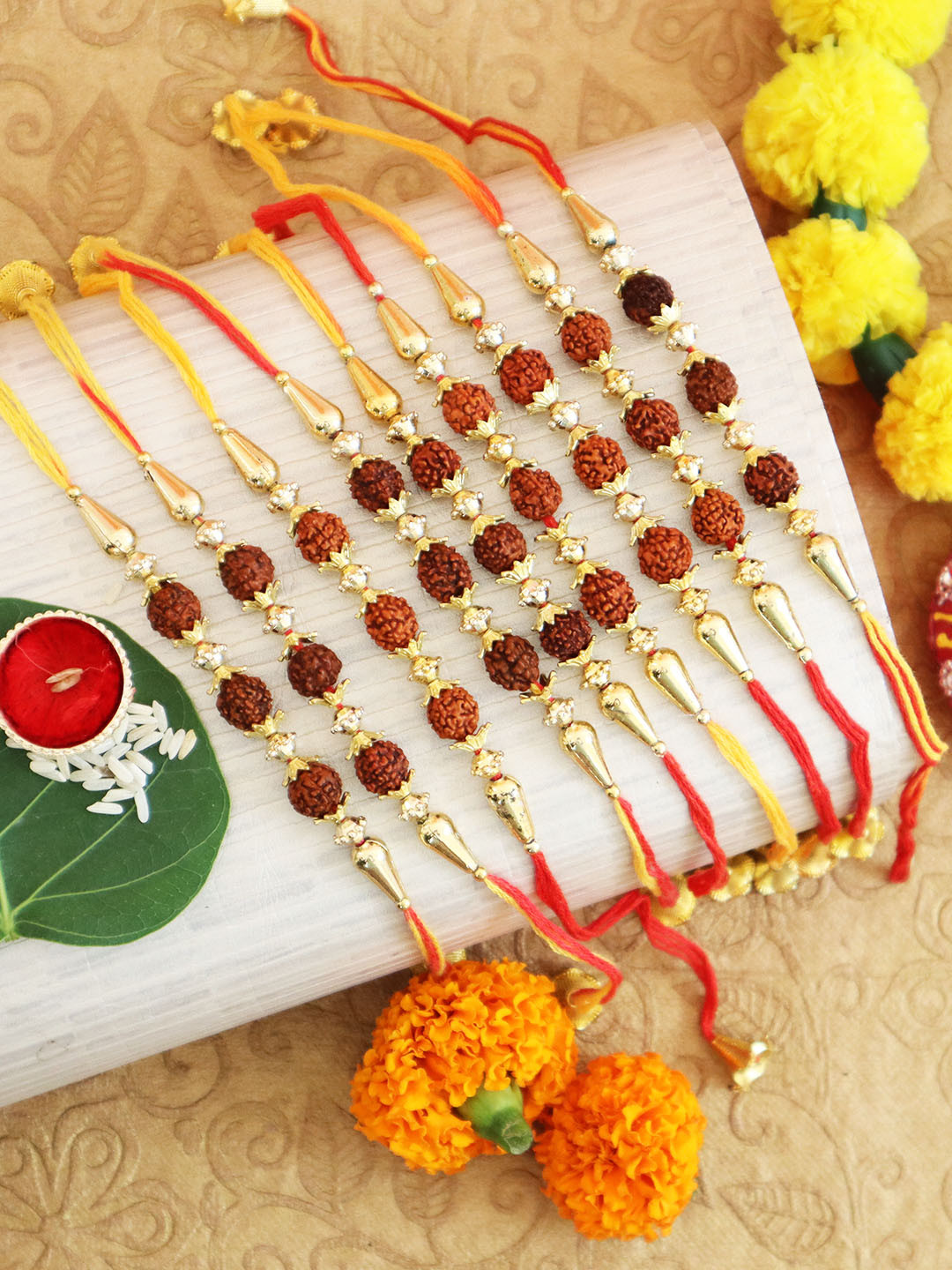 

TIED RIBBONS Set of 9 Rudraksha Rakhi Combo, Multi