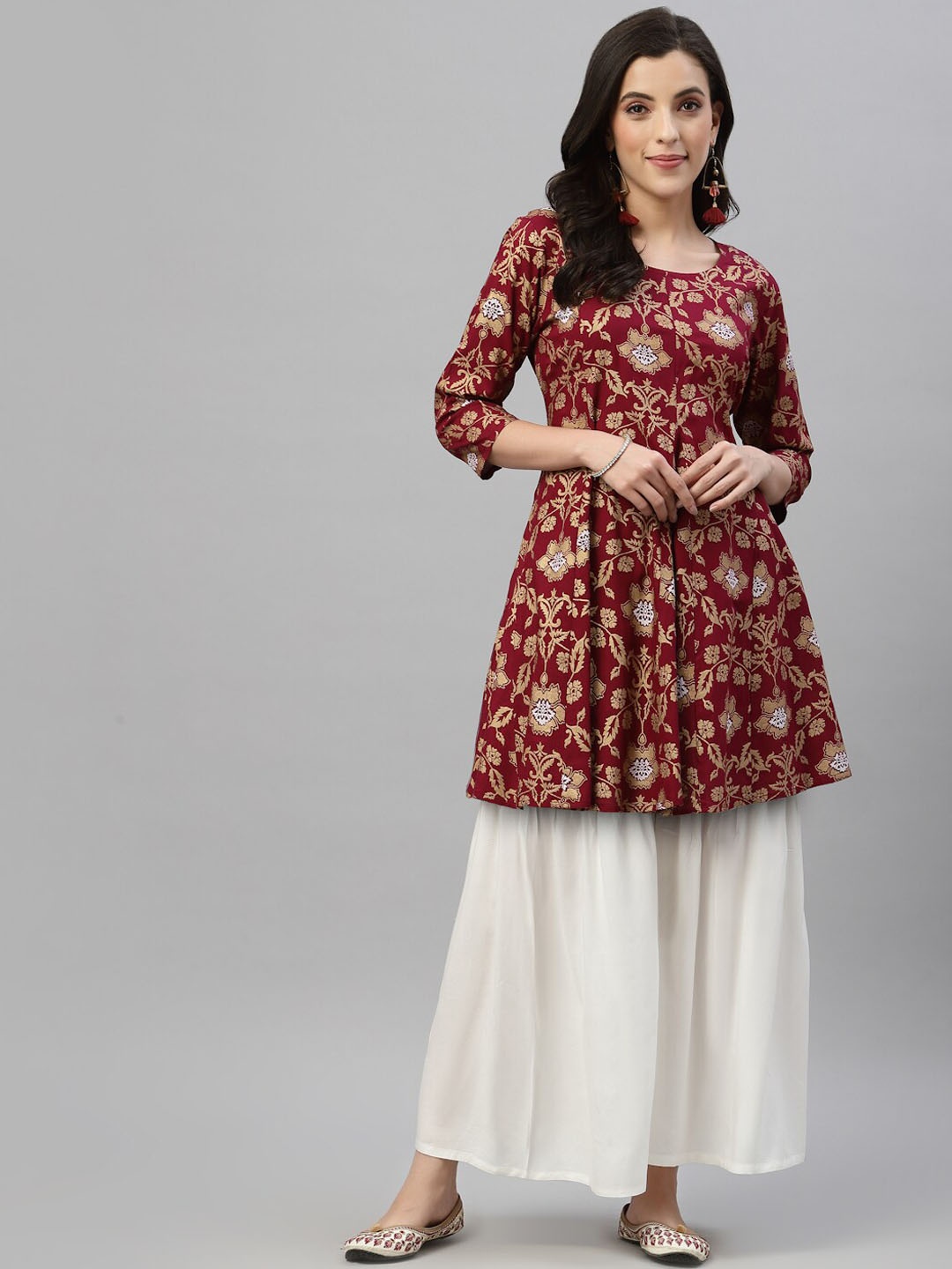 

The Mini NEEDLE Women Maroon Floral Printed Empire Kurti with Sharara