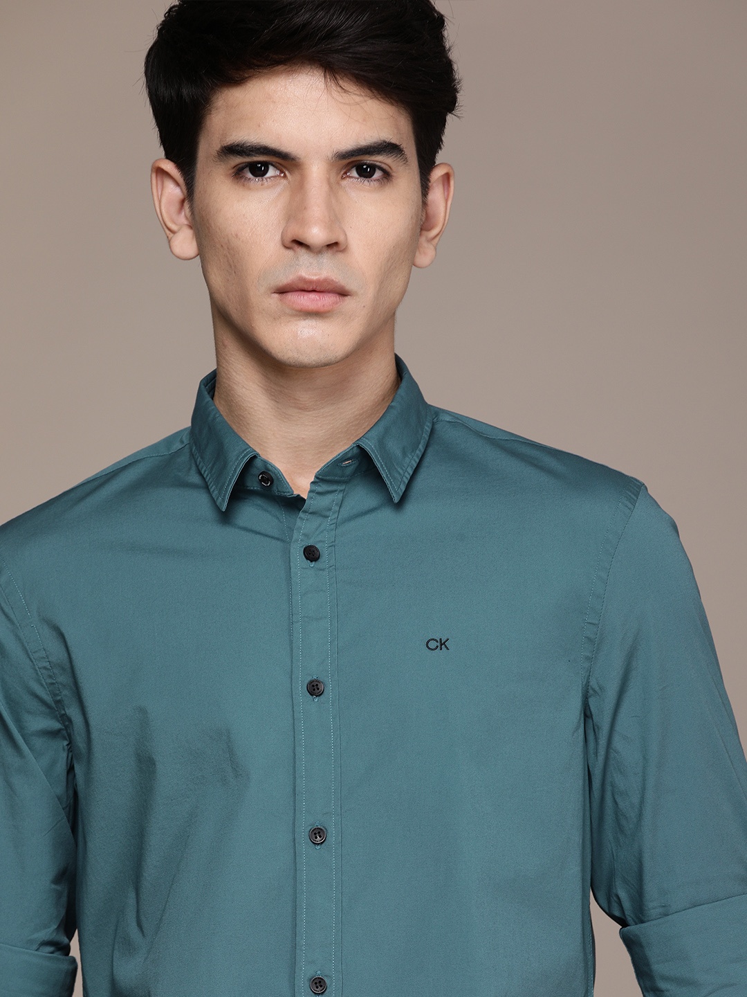 

Calvin Klein Jeans Men Teal Green Slim Fit Casual Shirt