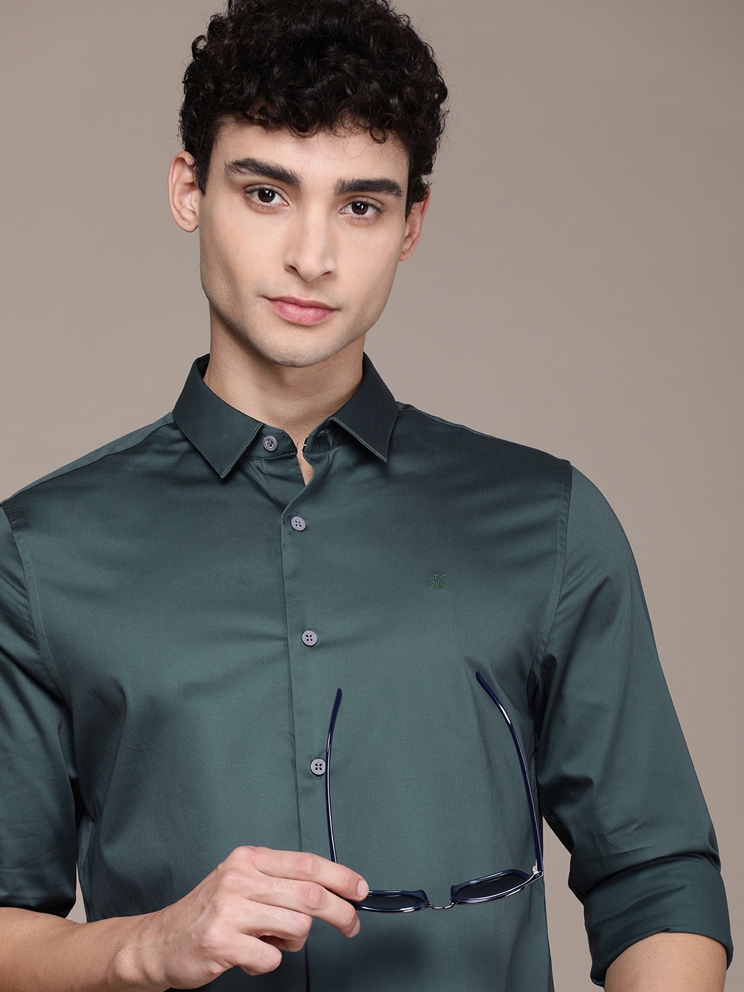 

Calvin Klein Jeans Men Teal Blue Solid Slim Fit Casual Satin Shirt
