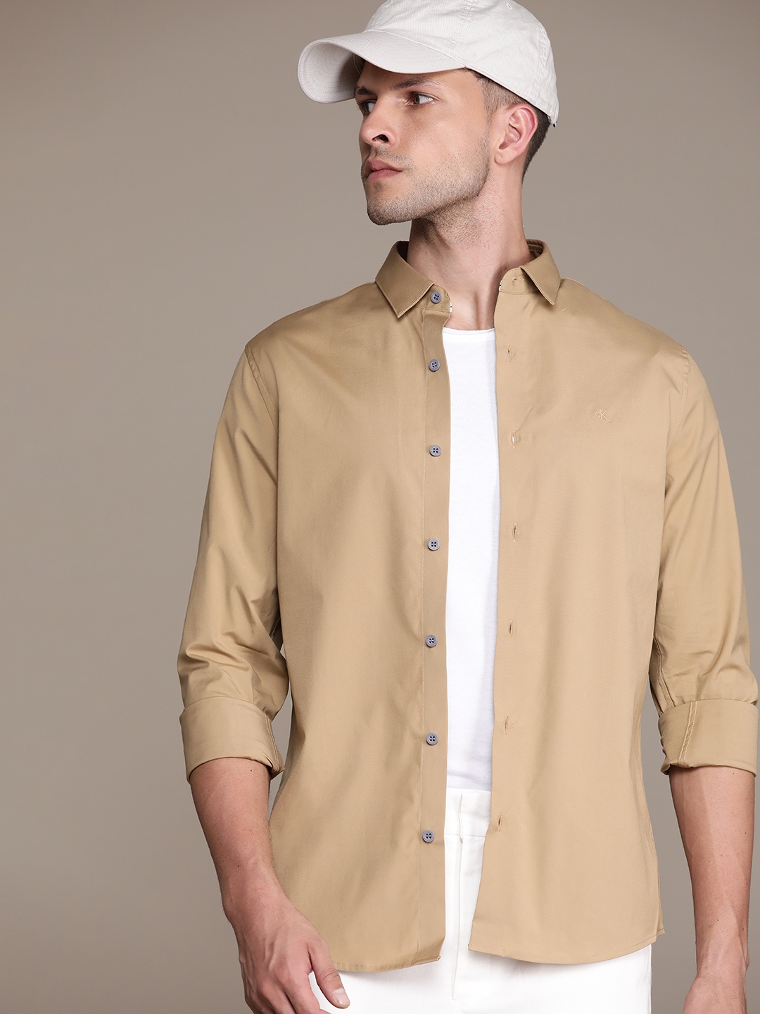 

Calvin Klein Jeans Men Brown Solid Slim Fit Casual Shirt