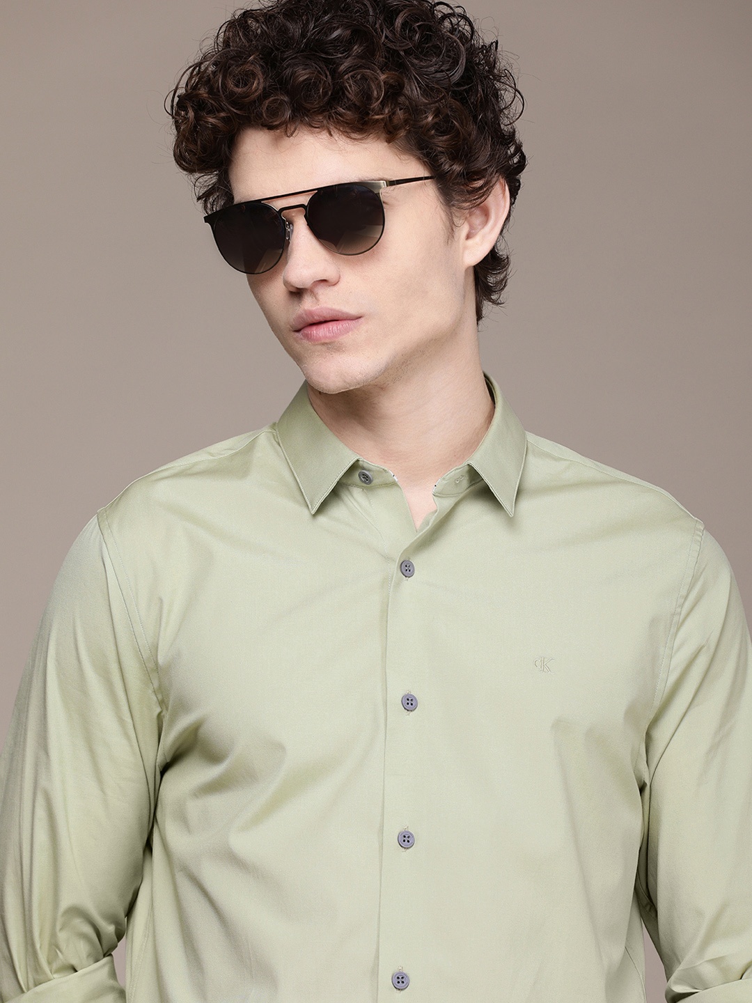 

Calvin Klein Jeans Men Light Green Solid Slim Fit Casual Shirt
