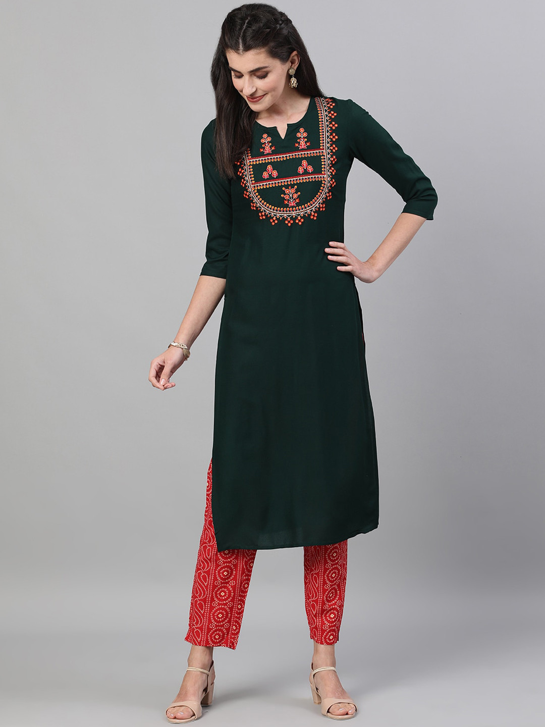 

KIMAYRA Women Green Yoke Design Panelled Kurti with Trousers