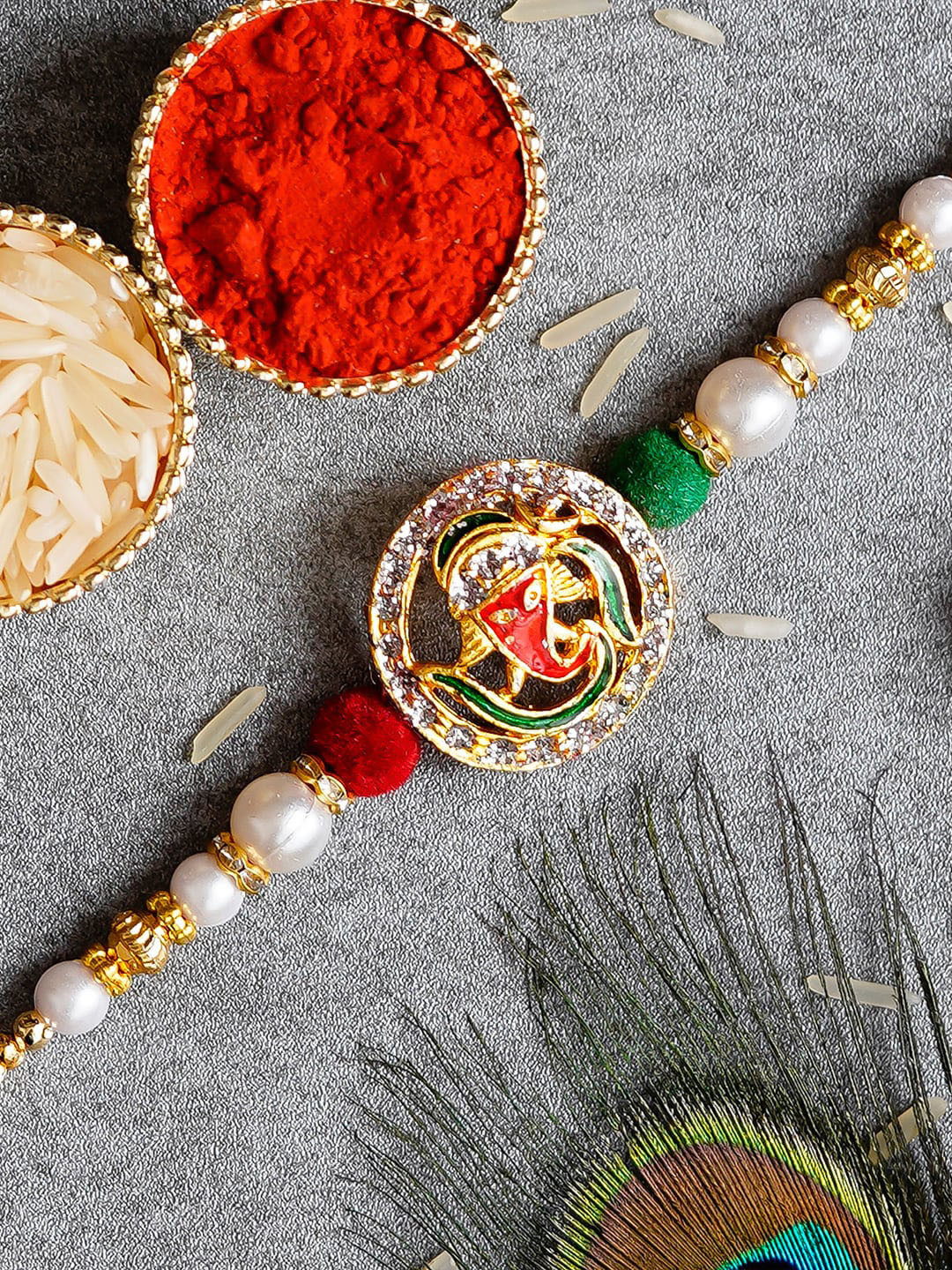 

eCraftIndia Multicolored Ganesha Design Rakhi with Roli Chawal, Multi