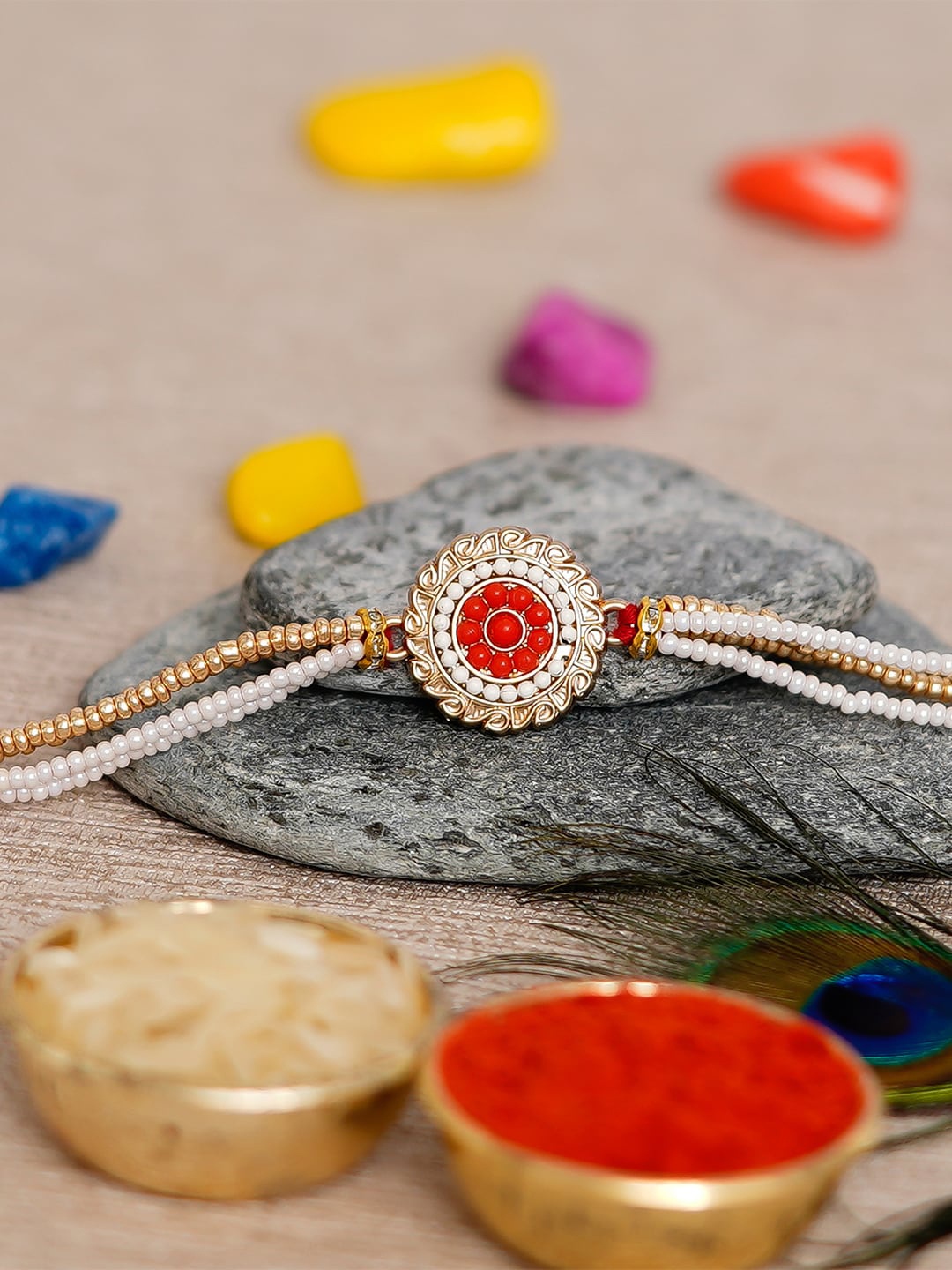

eCraftIndia Red & Gold-Toned Stone-Studded Rakhi