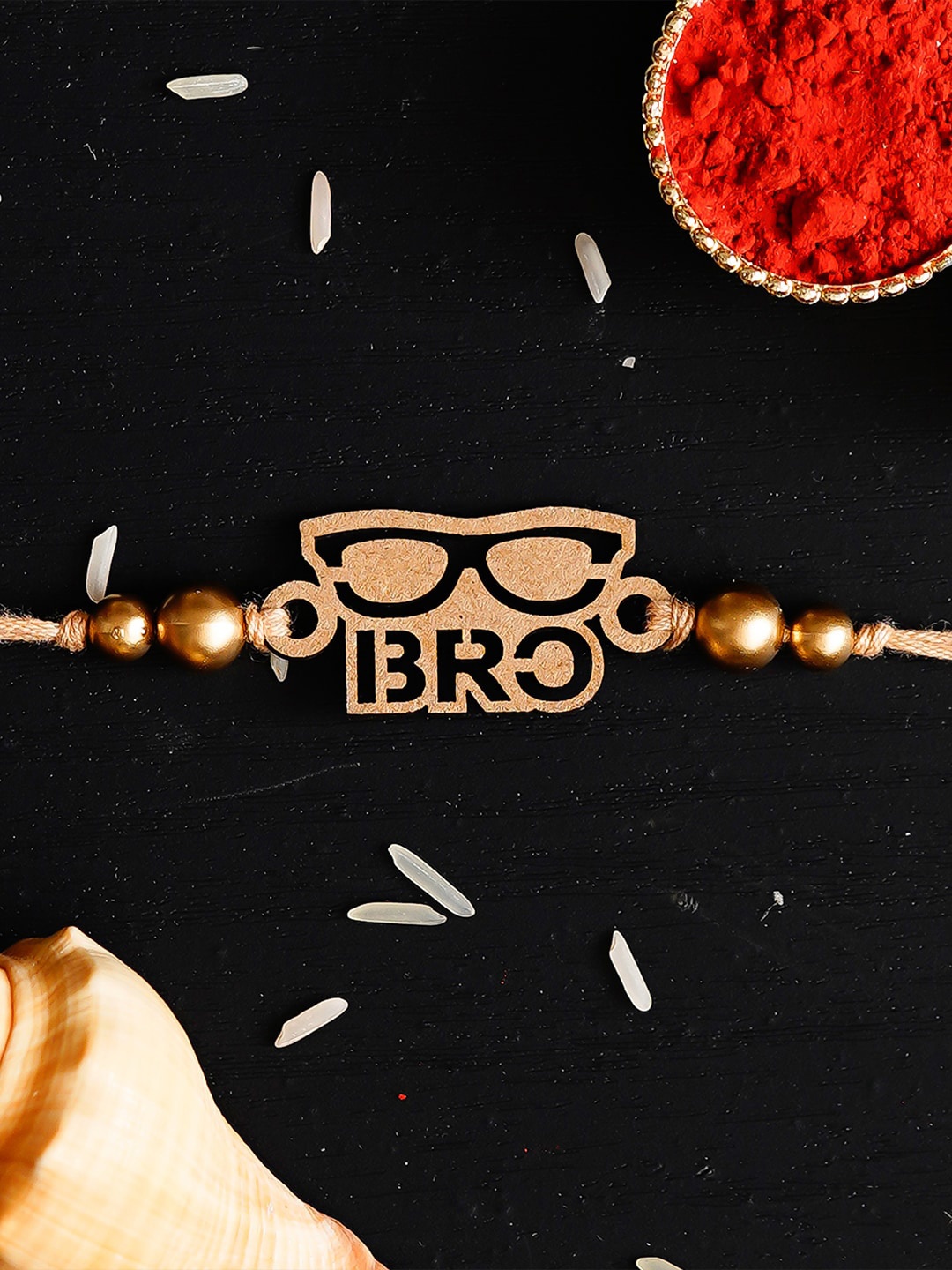 

eCraftIndia Gold Toned Designer Bro Rakhi and Roli Chawal Pack
