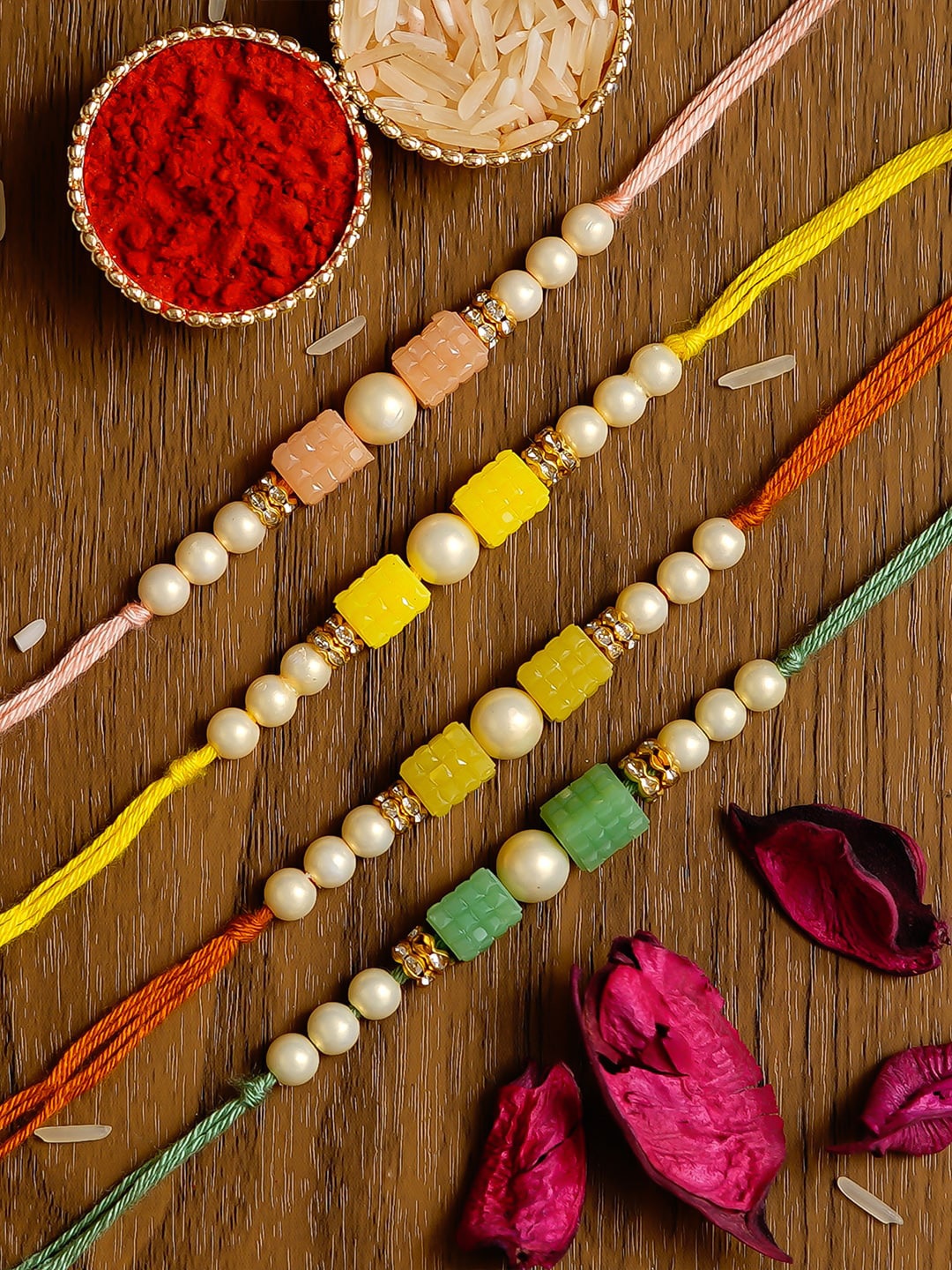 

eCraftIndia Pack of 4 Rakhis and Roli Chawal Pack, Multi