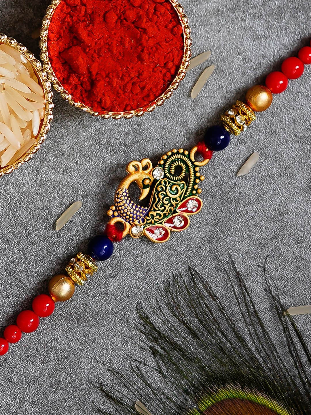 

eCraftIndia Red Peacock Rakhi with Roli Chawal